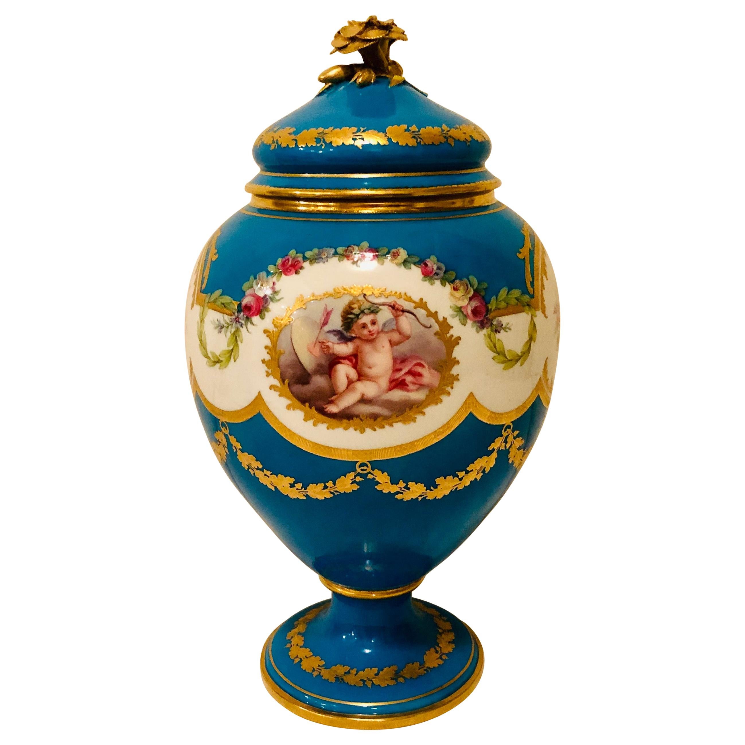 Celeste Blue Minton Urn Painted with Cherubs and Flowers in the Style of Sèvres
