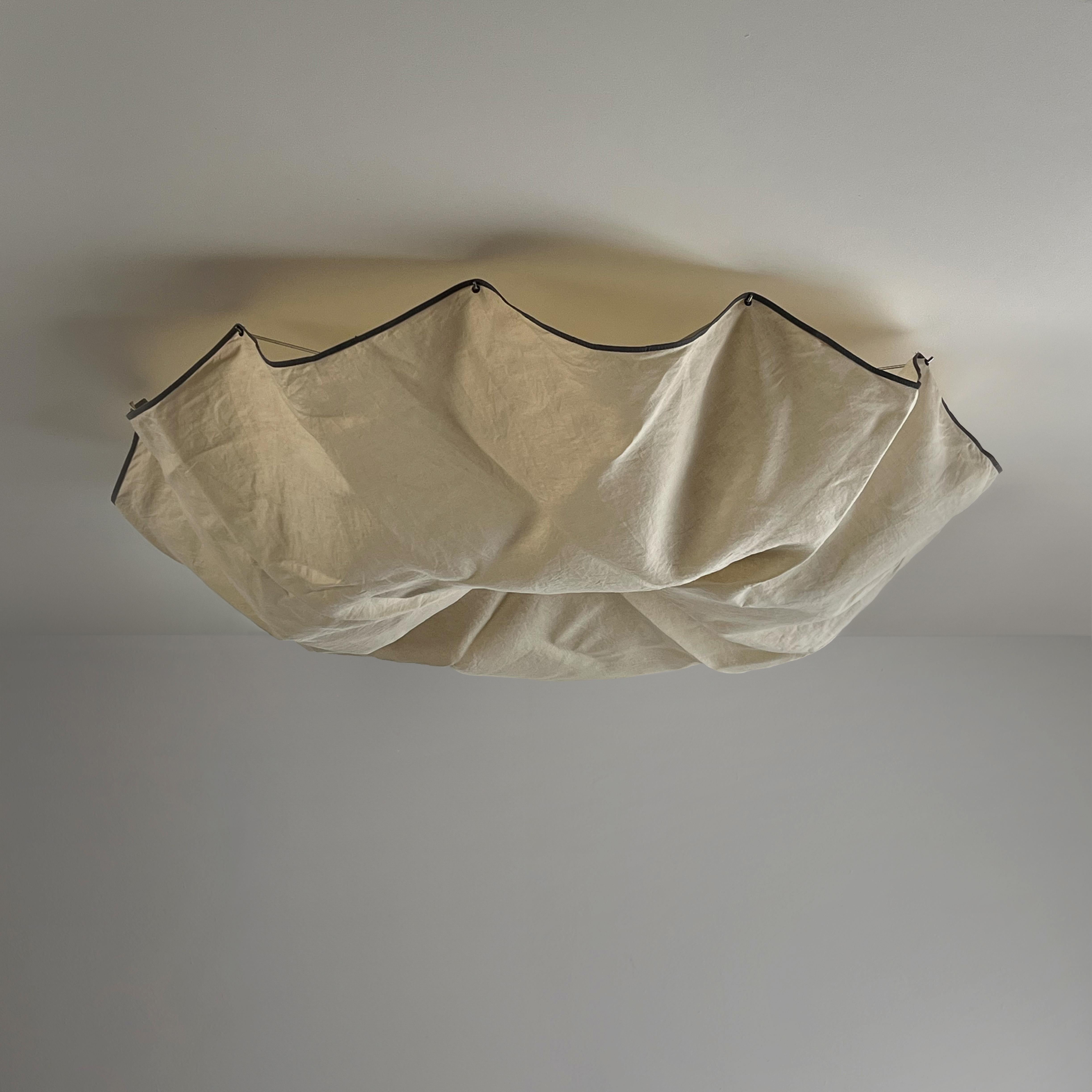 The Celestia ceiling lamp, a masterpiece of design crafted by Tobia Scarpa for Flos in the 1980s, embodies an unparalleled fusion of artistry and functionality.

Its majestic dimensions, standing as a testament to Scarpa's visionary genius, elevate