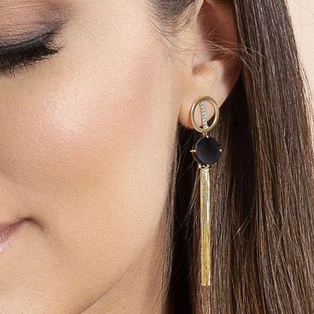 Kaloi Jewelry Gold Collection, Handcrafted in Brazil, 18 karat yellow gold, 10MM Black onyx stones. 18.5 inches necklace length with 0.75 pendant diameter, and 2.5 inches earring length. 

This striking handcrafted jewelry set is composed of an 18K