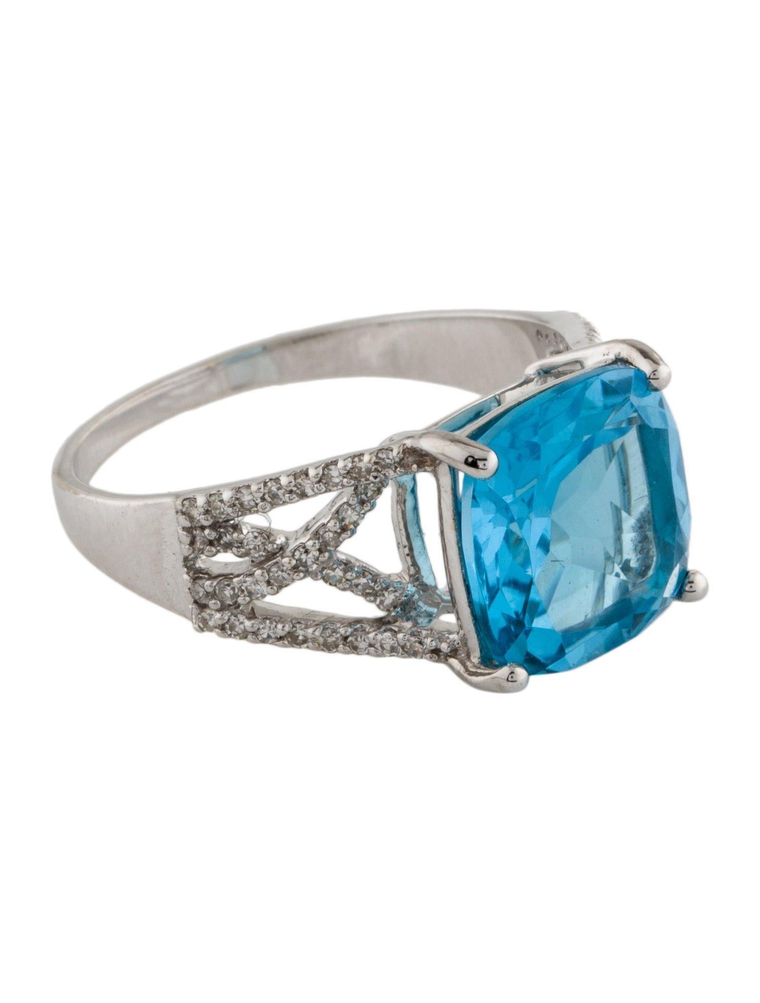 Indulge in the celestial allure of our Celestial Azure collection with this breathtaking Swiss Blue Topaz and Diamond ring from Jeweltique. Immerse yourself in the wonder of deep blue hues reminiscent of the vast, star-studded night sky, beautifully