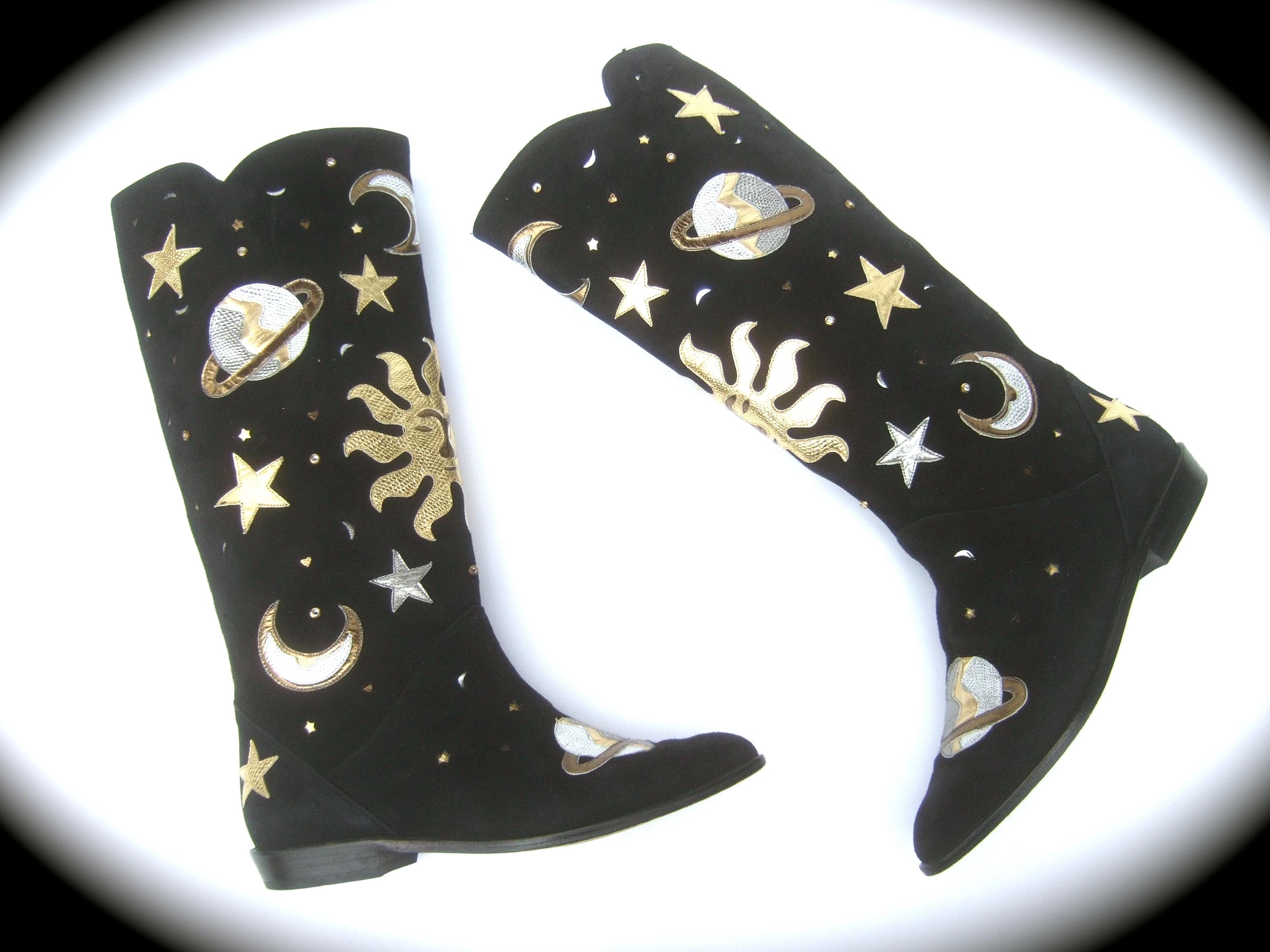 Avant-garde black suede metallic moons, stars, planets celestial sun boots US Size 7.5 M 
The rare avant-garde high fashion boots are constructed with plush black suede
Embellished with a collection of gold and silver metallic applique moons, stars,