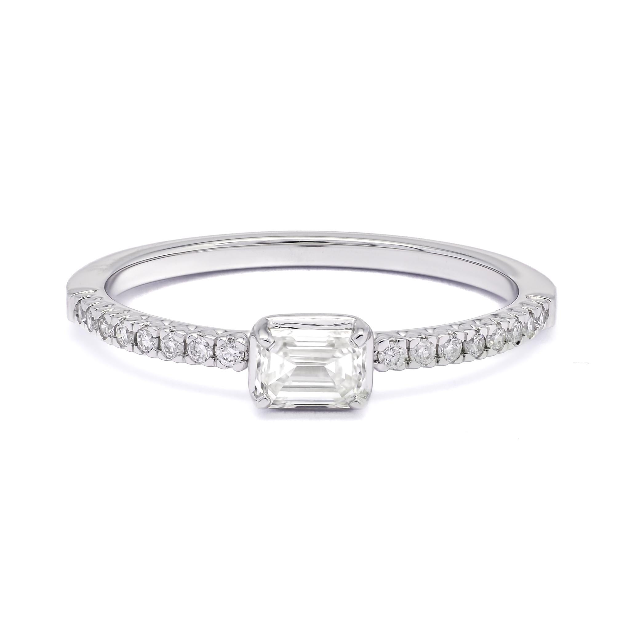 Embodying celestial elegance, this exquisite Emerald Cut Solitaire Ring in 18K White Gold boasts a mesmerizing 0.25 carat Emerald, capturing the essence of timeless sophistication. Crafted with utmost precision and skill, the enchanting Emerald