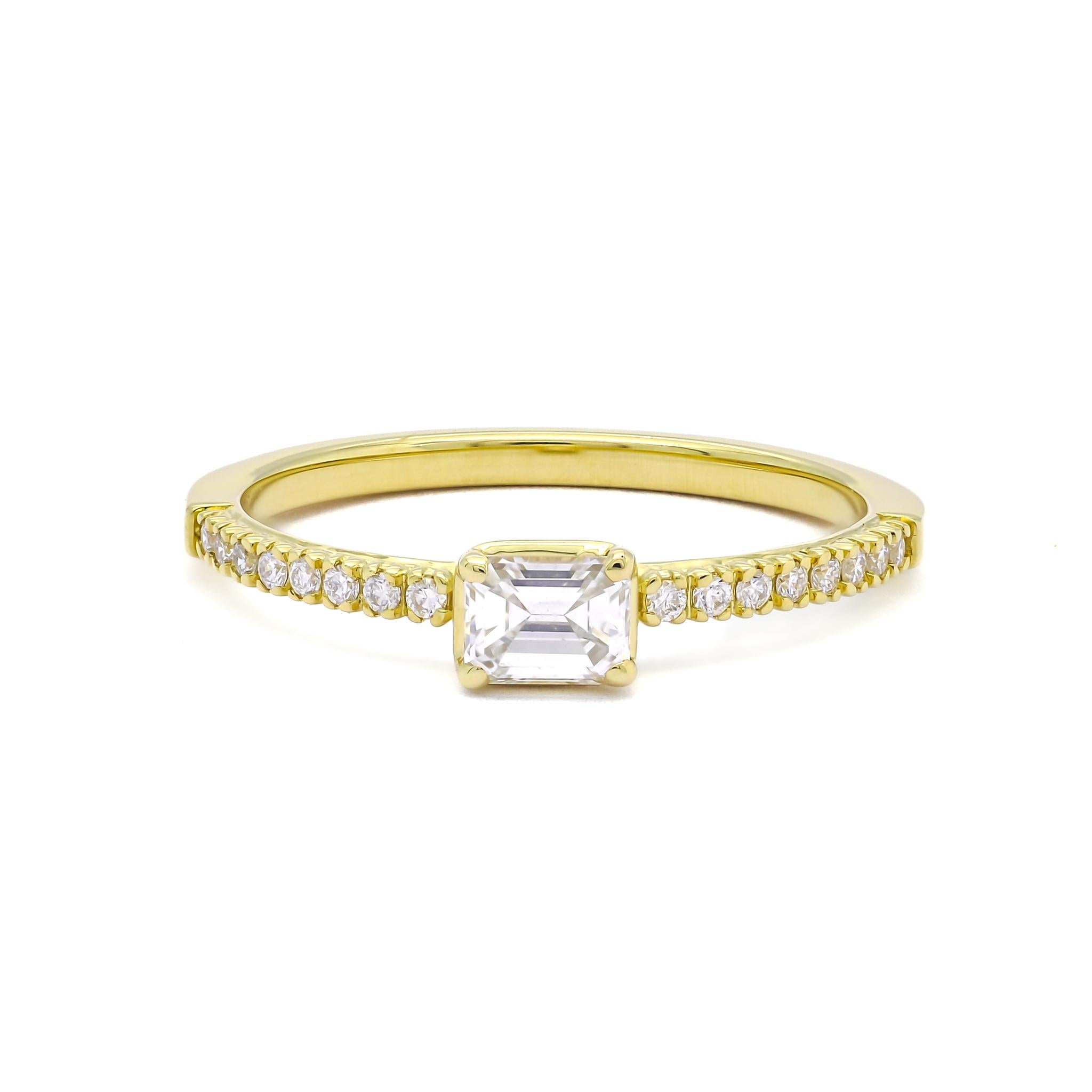 Embodying celestial elegance, this exquisite Emerald Cut Solitaire Ring in 18K Yellow Gold boasts a mesmerizing 0.25 carat Emerald, capturing the essence of timeless sophistication. 

Crafted with utmost precision and skill, the enchanting Emerald