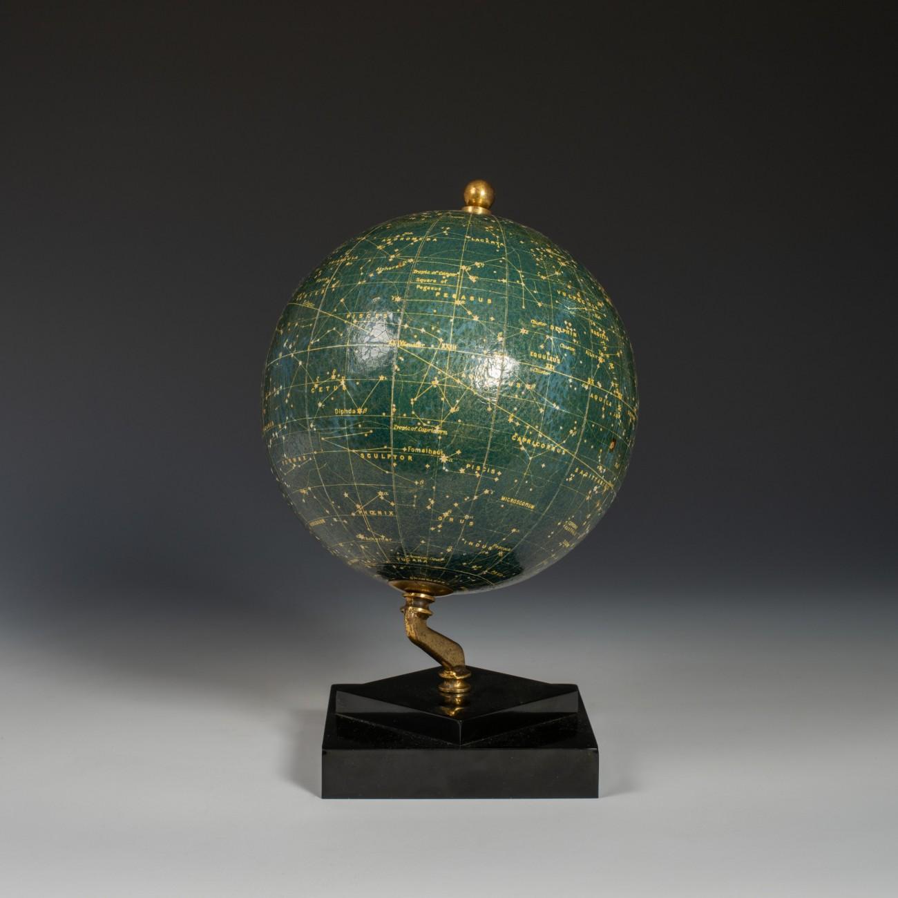 A delightful celestial globe on a square bakelite base showing the constellations and many named stars, by Philips of London, circa 1935.

Dimensions: 15 cm/6 inches (globe diameter)

When looking at the stars from Earth the viewpoint is effectively