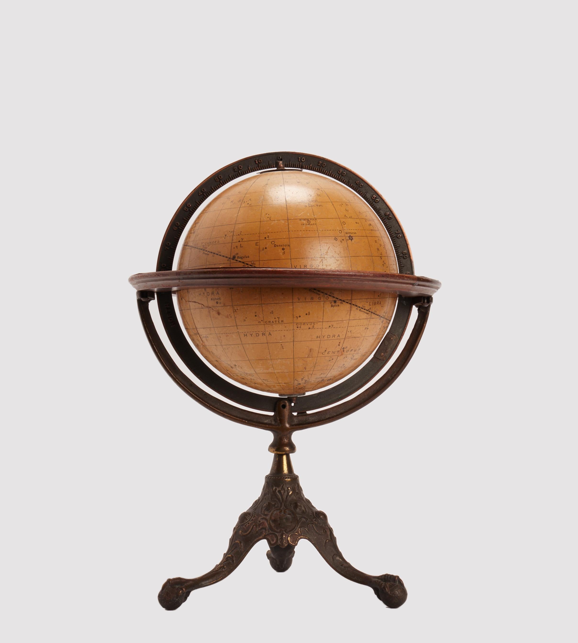 American paper mâché celestial globe, wooden horizon circle, cast iron tripod. Showing the positions of the principal stars and circles, by John Duncan, professor of astronomy, maker: Rand Mc. Nelly and co. USA, circa 1900.