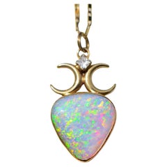 Celestial Mirrored Moon Pendant with Statement Sized Fiery Rainbow Color