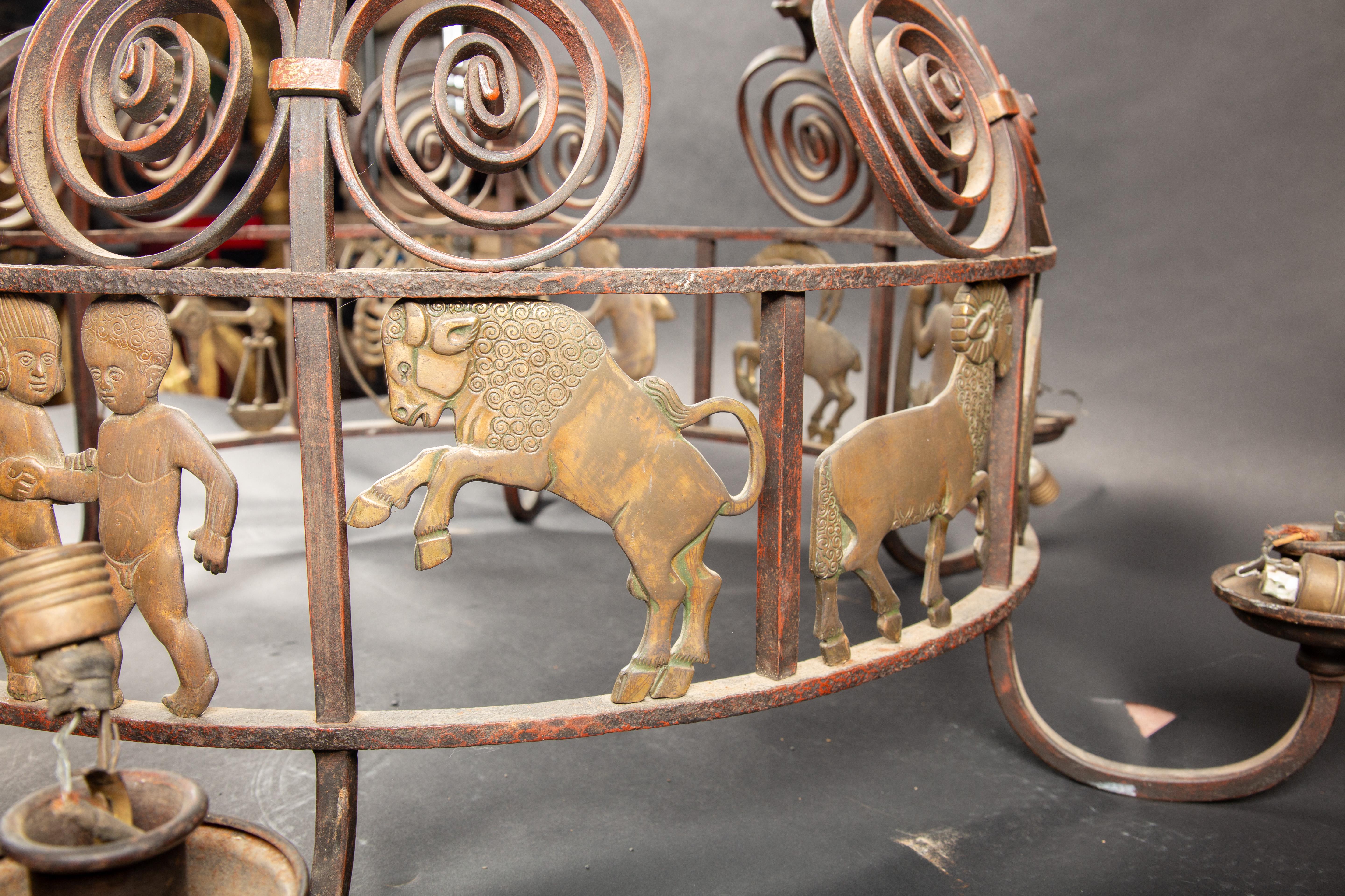 Celestial Splendor: 1920's French Art Deco Iron and Bronze Zodiac Chandelier For Sale 3
