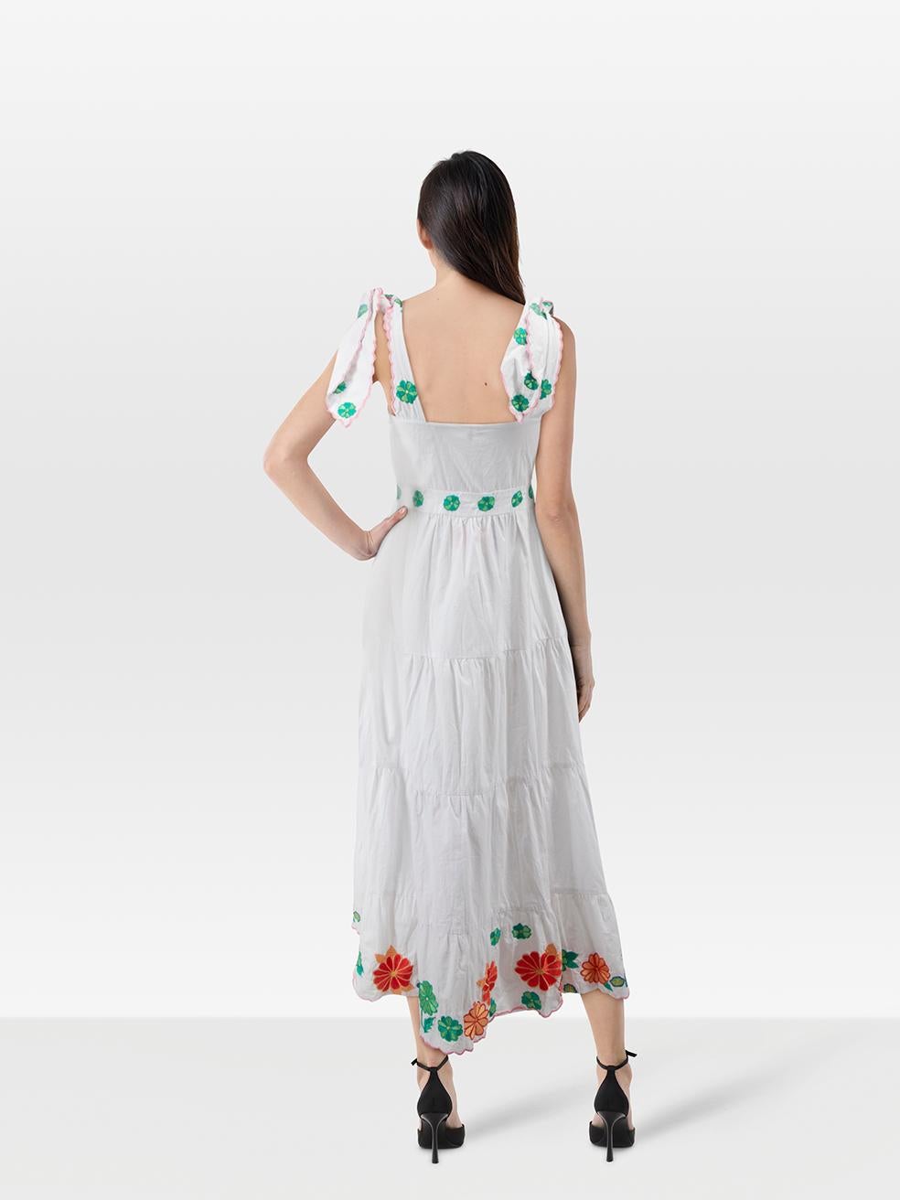 CONDITION is Never worn, with tags. No visible wear to dress is evident on this new Celia B designer resale item.
 
 
 
 Details
 
 
 White
 
 Cotton
 
 Dress
 
 Embroidered and beaded floral pattern
 
 Midi
 
 Sleeveless
 
 Tied shoulder straps
 

