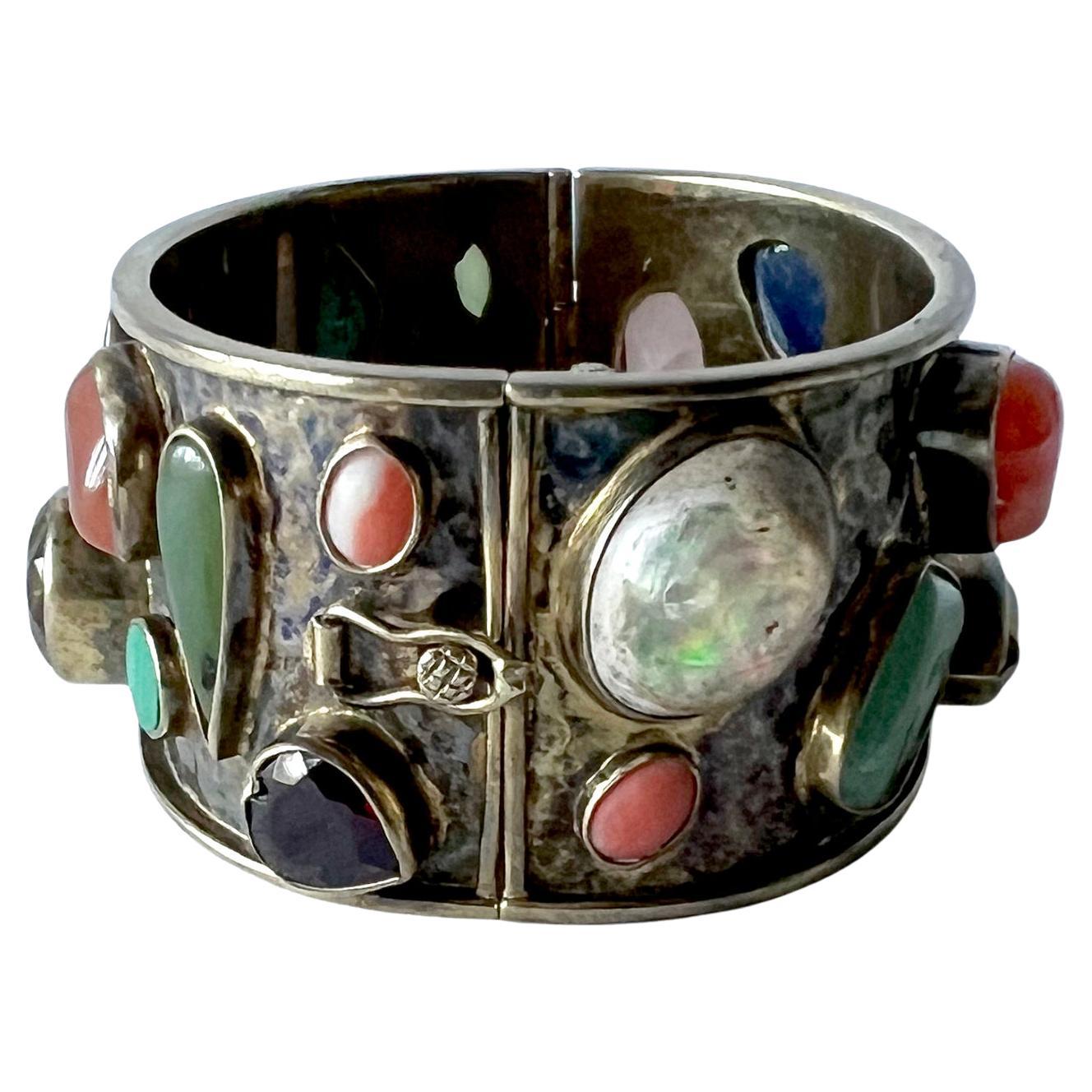 silver cuff bracelet with gemstones