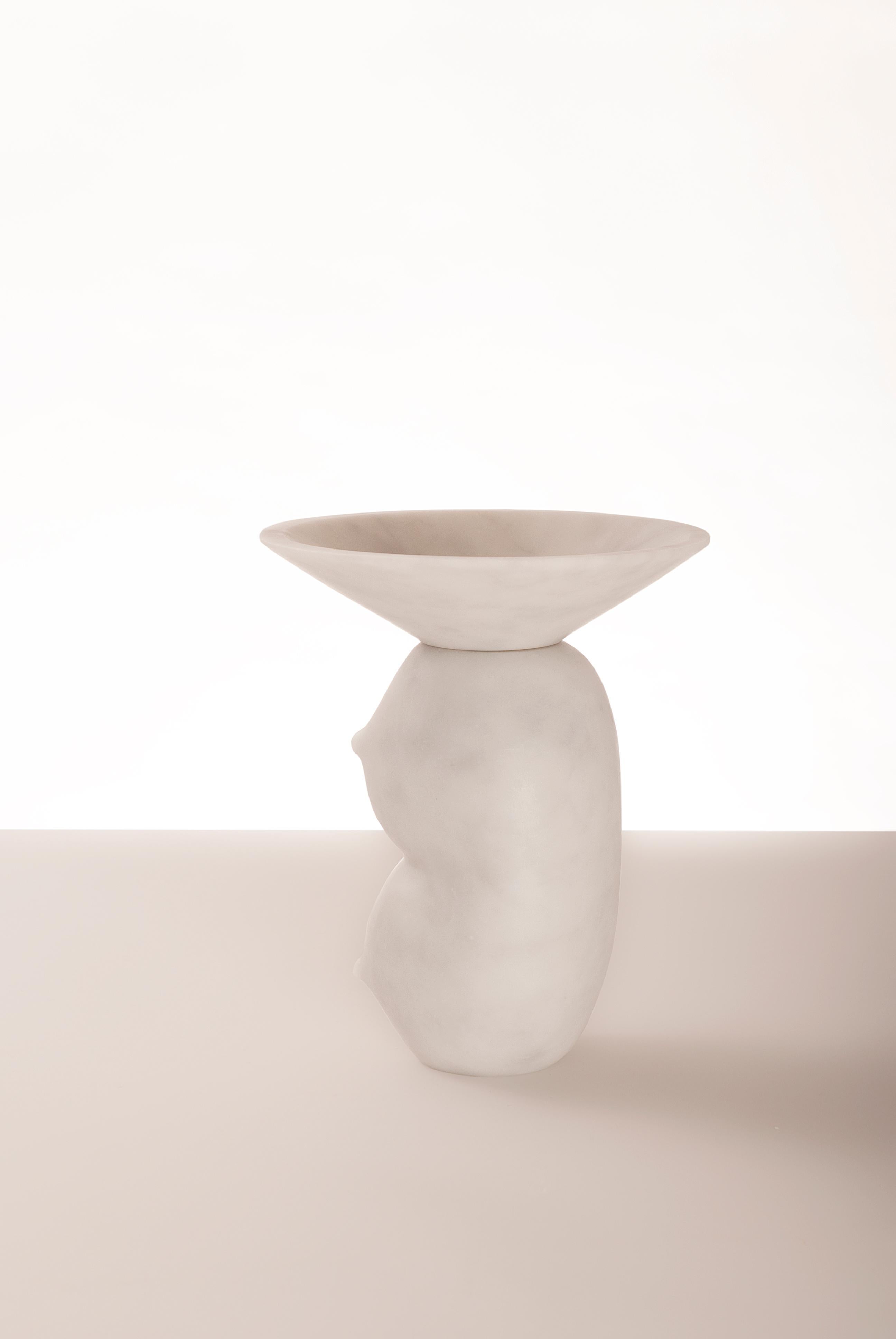 Celia - Duo-Marble Contemporary vase - Valentina Cameranesi
Materials: White carrara marble (Also available in Noir Antique + Portugal Pink)
Dimensions: 31 x 24 x 24 cm

The “Avalon” series consists of 3 sculptural vases, made of White