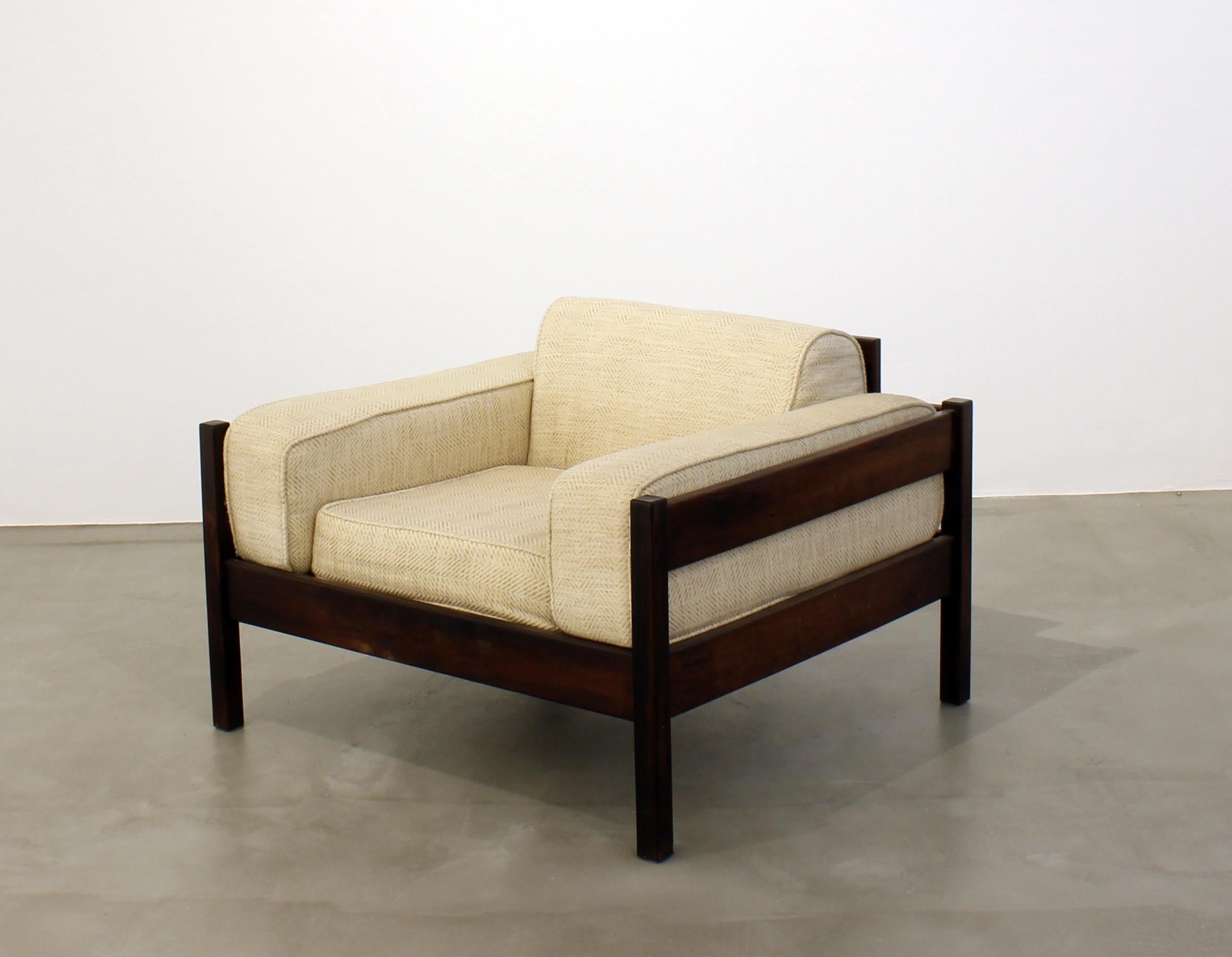 Beautiful vintage armchair by Celina Decoracoes featuring rich Brazilian wood and clean sophisticated lines.