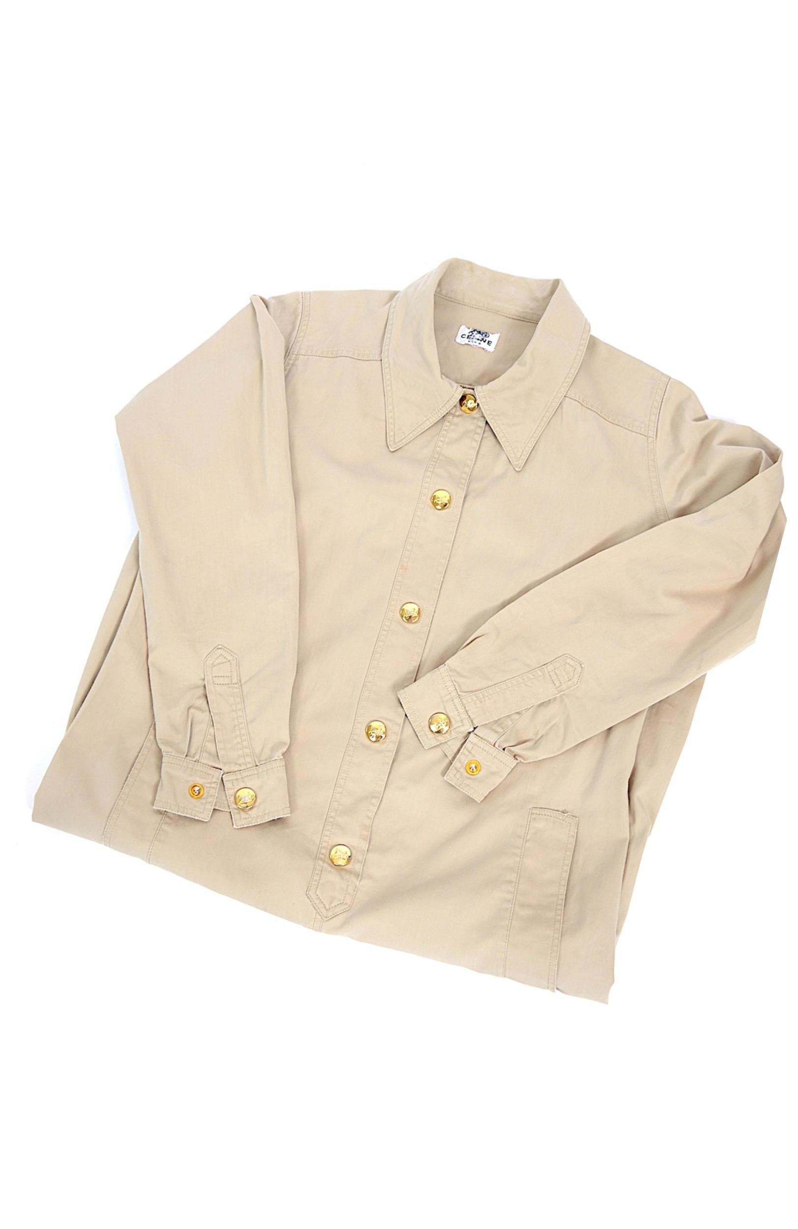 Women's Celine 1970s vintage safari dress with gold buttons and slide front pockets