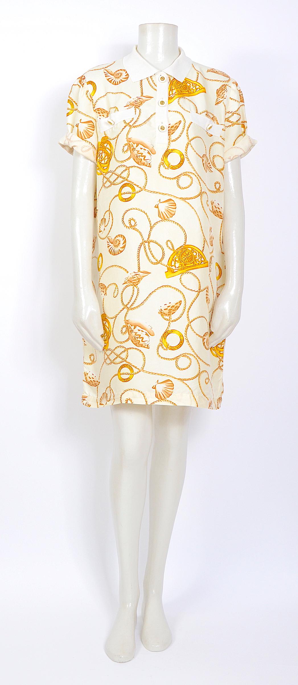 Beautiful Celine 1980s gold cord and logo print on a creme silk dress, 
White & gold Celine signature buttons - 100%silk - unlined.
Made in Italy - Italian size 46 - but could be worn oversize style, our doll is a french size 36.
Measurements are