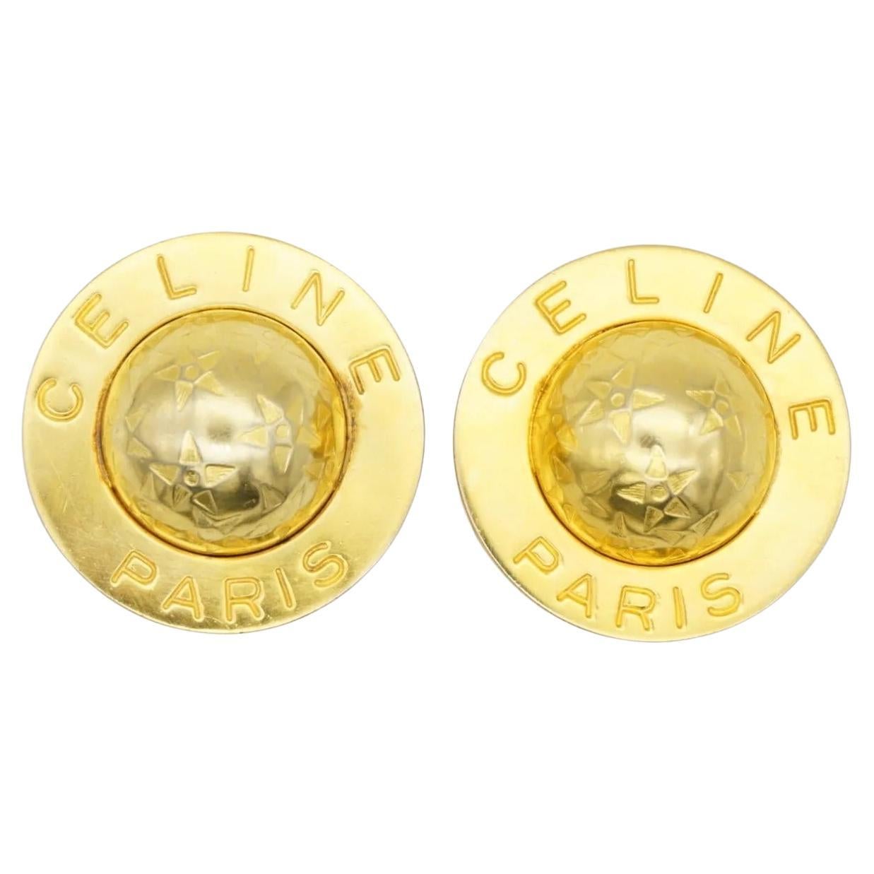 Celine Paris 1989 Vintage Extra Large Iconic Logo Globe Celestial Stars Round Clip Chunky Earrings, Gold Plated

Very good condition. 100% Genuine.  Maybe light scratches or colour loss, barely noticeable.

A very beautiful pair of earrings by