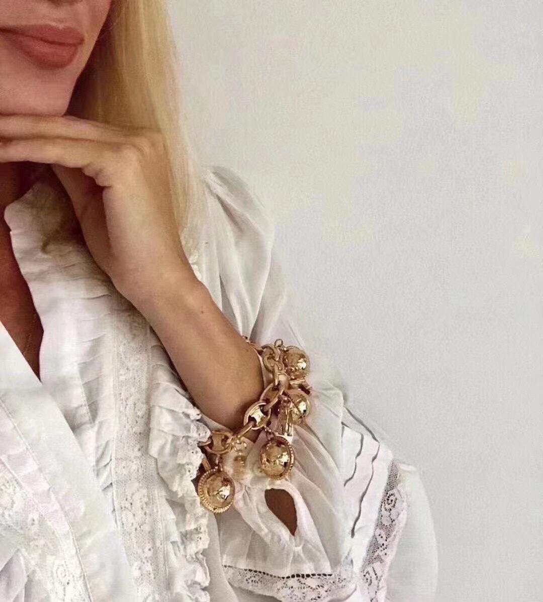 Celine 1990s Gold-tone Triomphe Planet Link Charm Bracelet For
