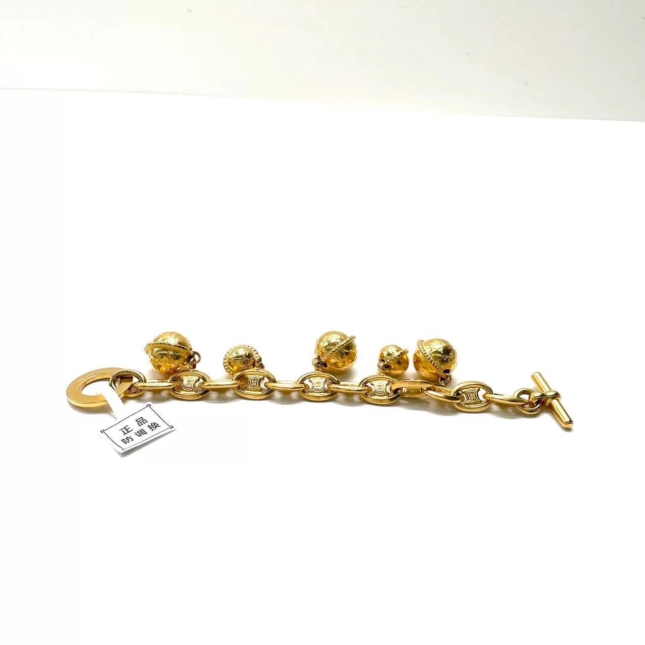 Celine 1990s Gold-tone Triomphe Planet Link Charm Bracelet For