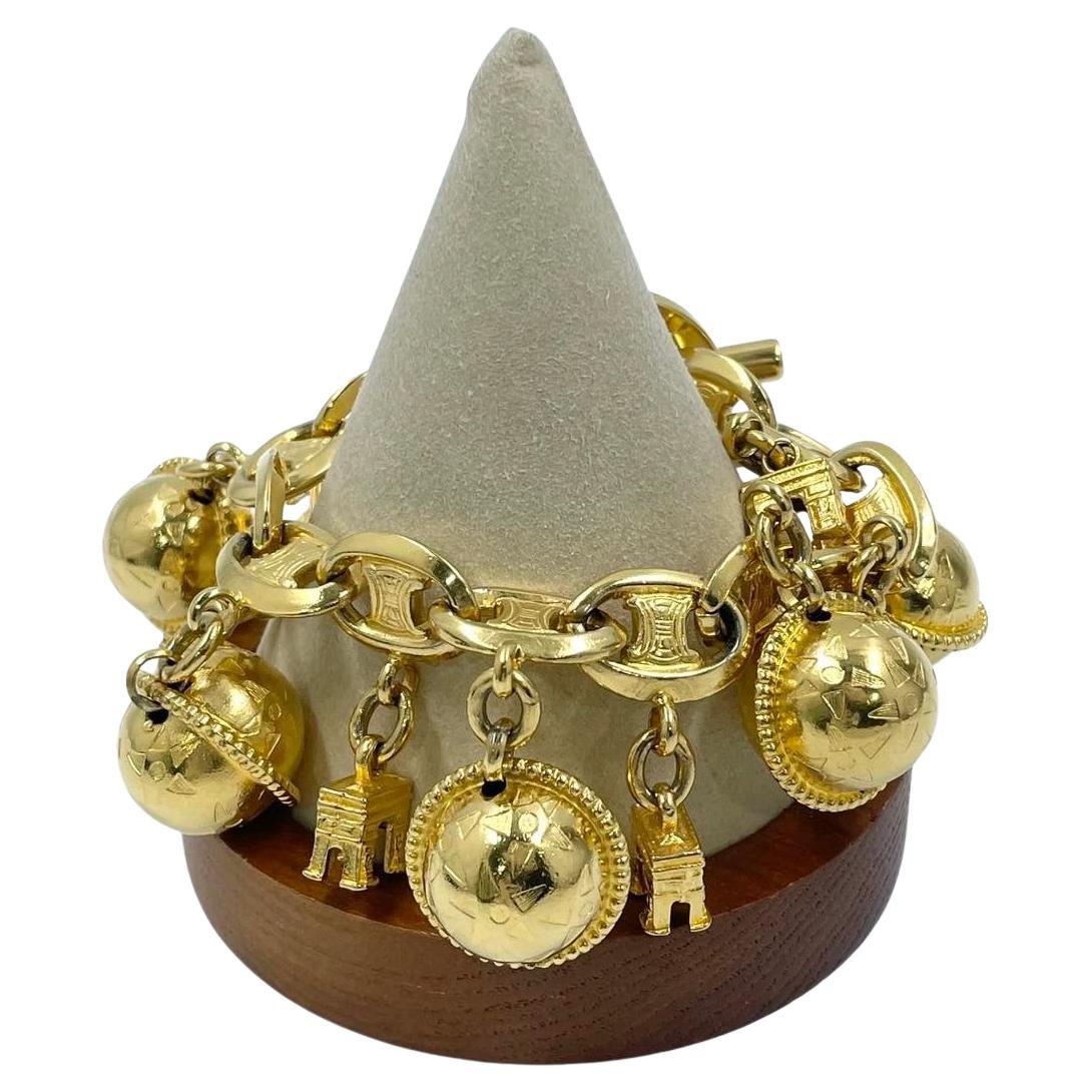 Celine 1990s Gold-tone Triomphe Planet Link Charm Bracelet For Sale