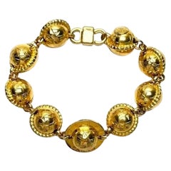 Celine 1990 Bracciale con charme Triomphe Planet in tonalità oro