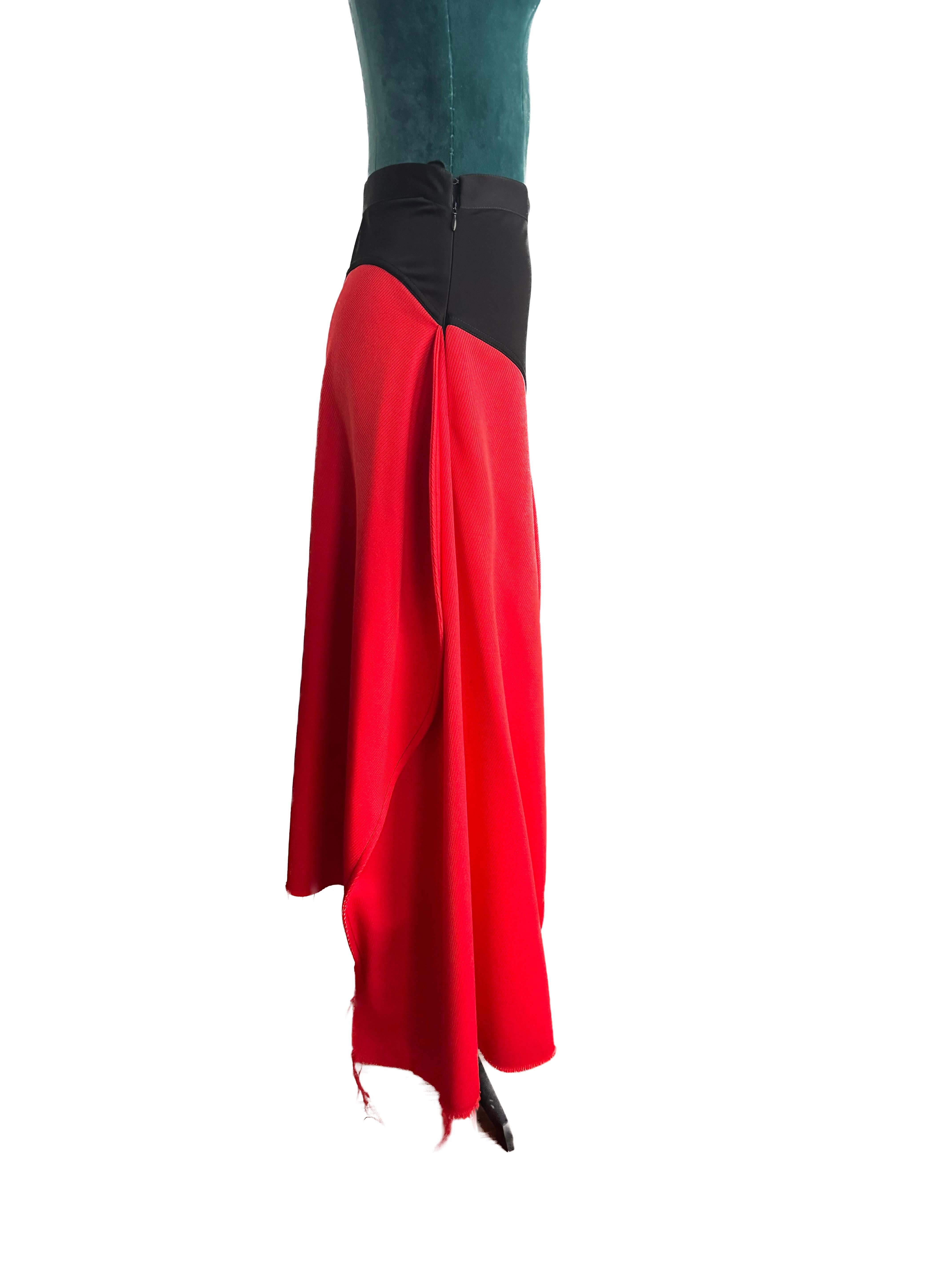 In the Celine 2017 runway collection, there was a striking black maxi skirt with contrasting red details, designed in a size 36. This piece showcased a modern and sophisticated take on a classic silhouette.

The black maxi skirt served as a canvas