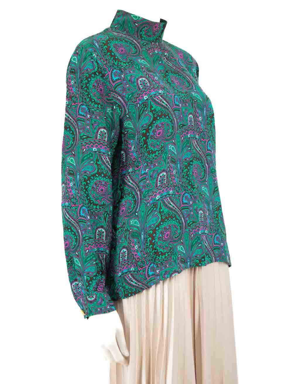 CONDITION is Very good. Hardly any visible wear to blouse is evident on this used Céline designer resale item.
 
 
 
 Details
 
 
 Multicolour - Green tone
 
 Silk
 
 Blouse
 
 Abstract pattern
 
 Long sleeves
 
 Mock neck
 
 Back button fastening
