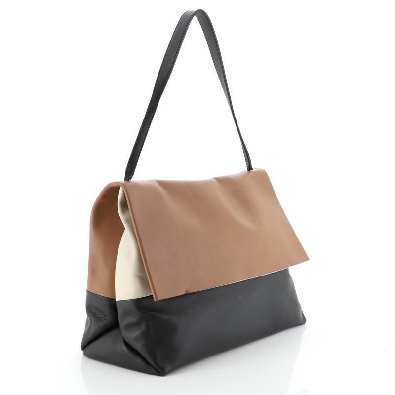 Estimated Retail Price: $2,785
Condition: Good. Wear on base corners, mark on rear exterior, darkening and wear on front underneath flap, fading on front logo, cracking on handle and flap wax edges, piling and wear in interior, scratches on