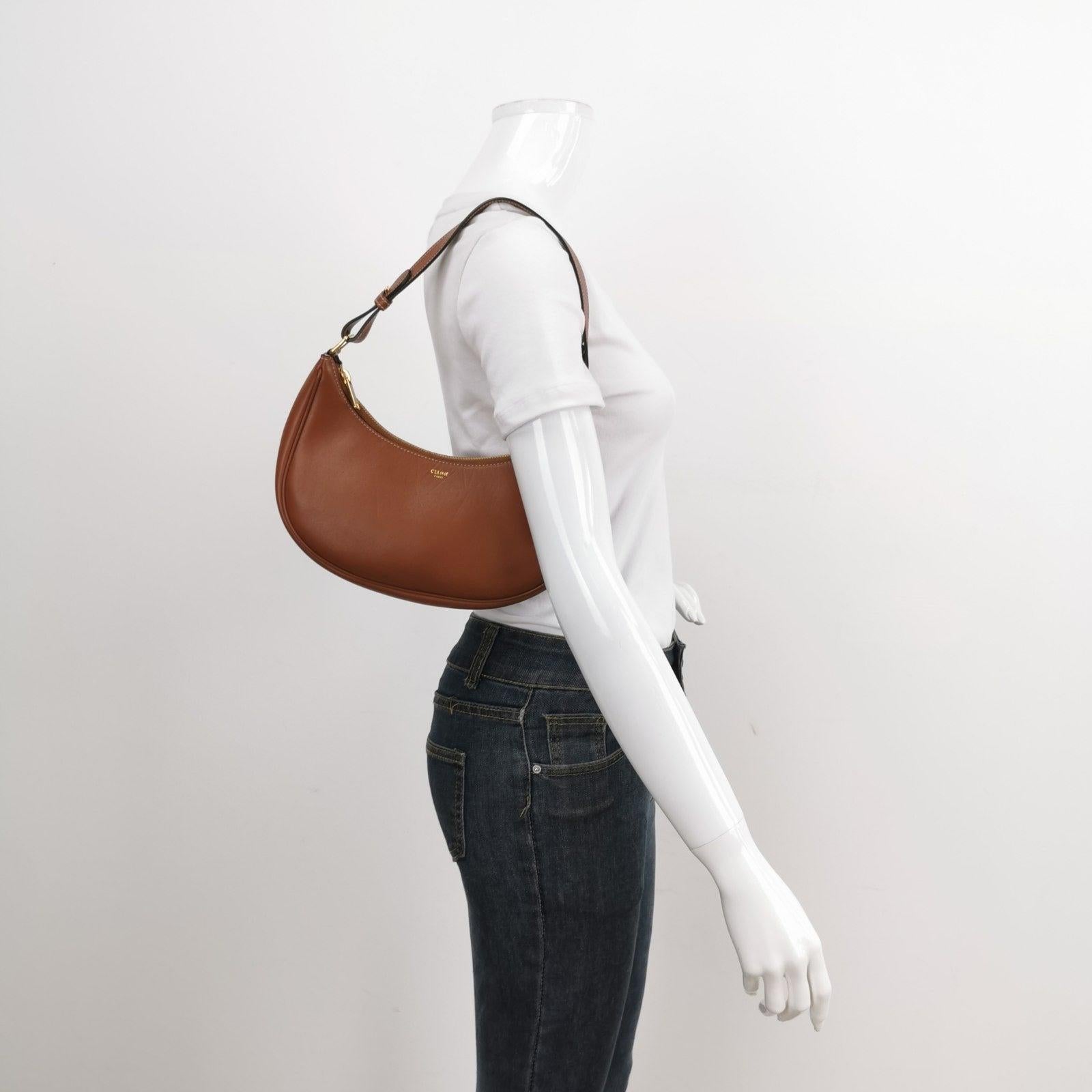 Celine Ava Hobo Natural Tan Brown Leather Shoulder Bag These are professional photos of the actual bag offered by Luxbags. CONDITION: EXCELLENT This preloved item is in excellent condition with minimal signs of use throughout. There may be some