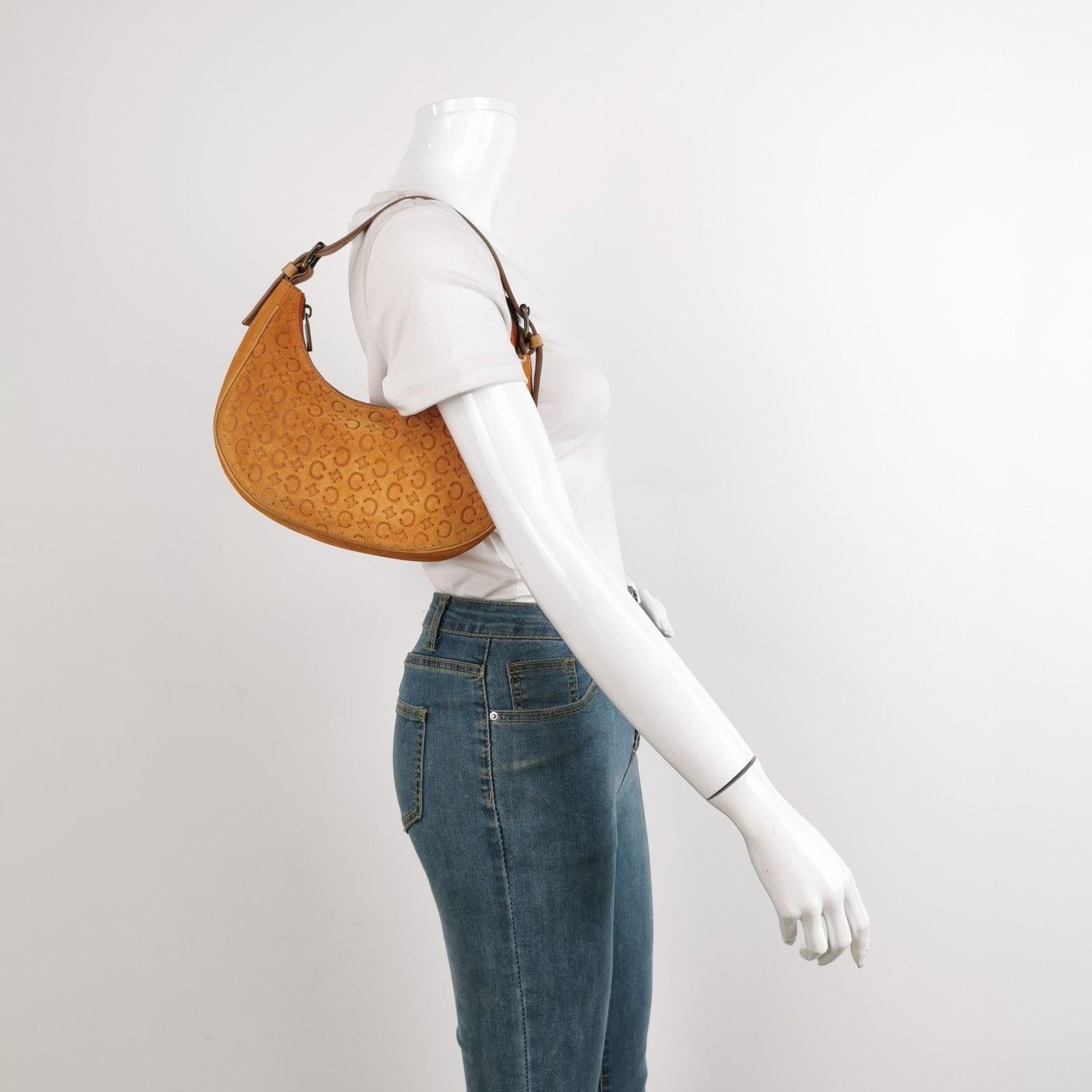 Celine Ava Hobo Pumpkin Caramel Brown Suede Leather Vintage Shoulder Bag These are professional photos of the actual bag offered by Luxbags. 
 
 CONDITION: VERY GOOD This preloved item is in excellent condition with light signs of use throughout.