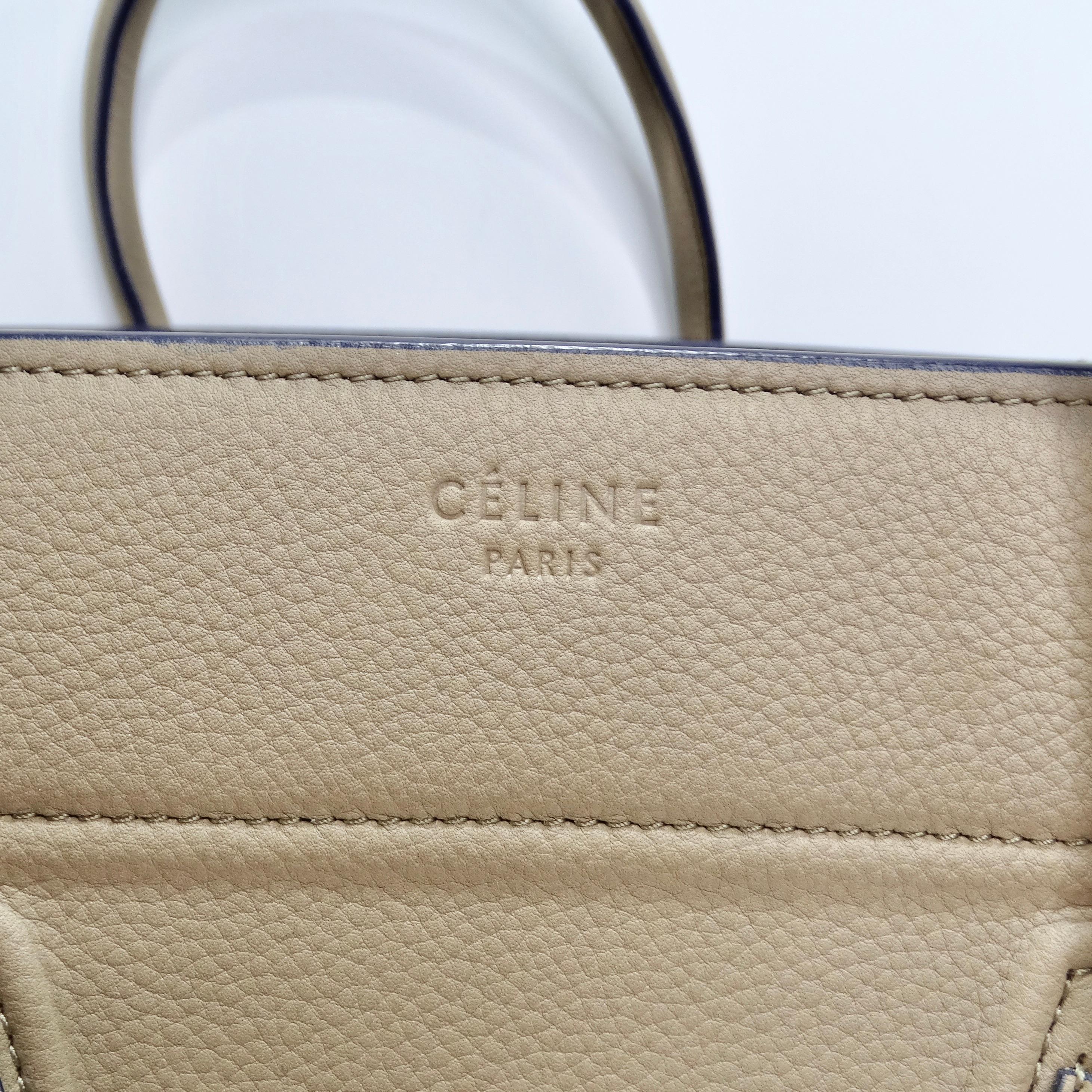 Introducing the Celine Beige Calfskin Leather Medium Phantom Luggage Tote Bag—a perfect fusion of modern sophistication and timeless style. This iconic tote bag, crafted in luxurious beige calfskin leather, is designed in the recognizable phantom