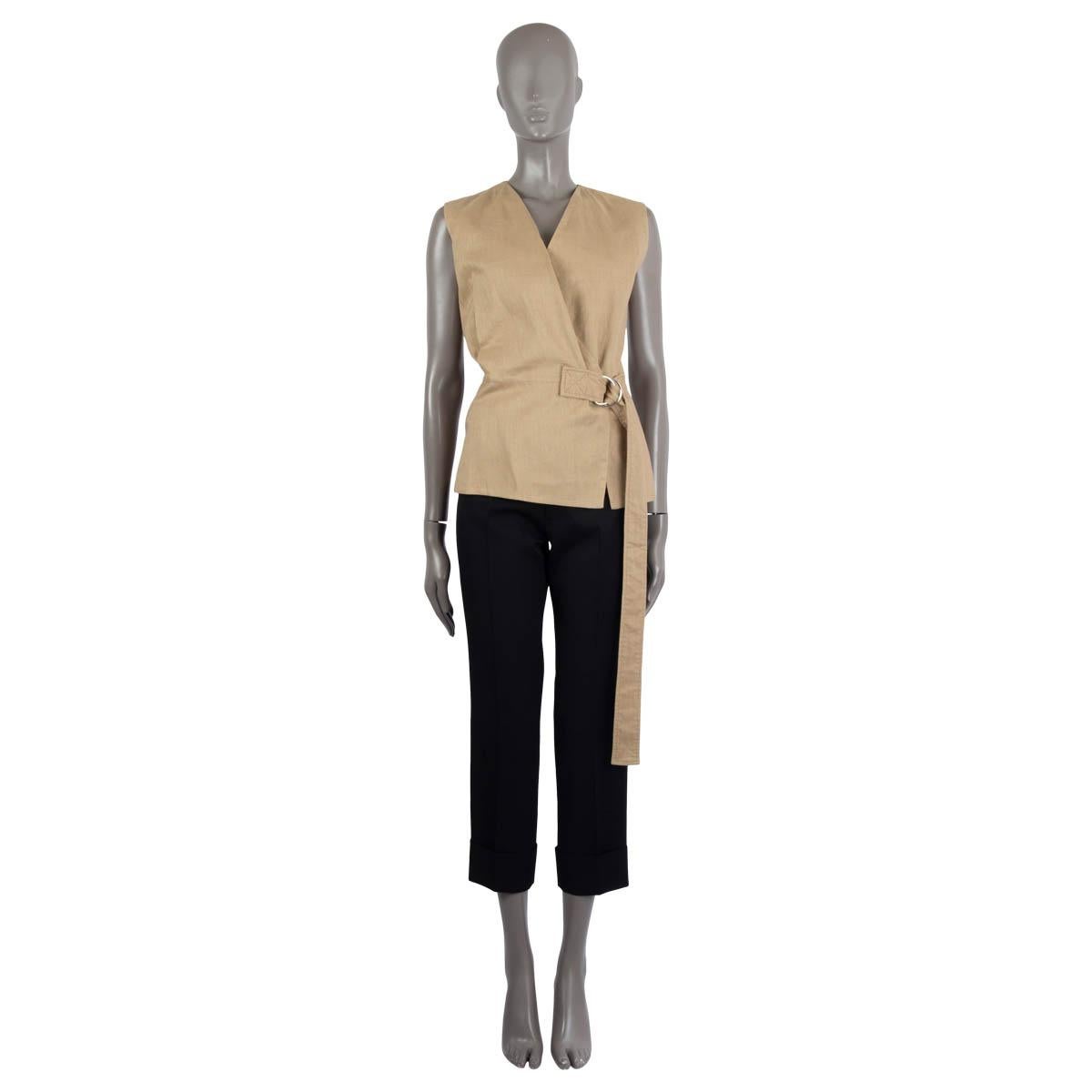 100% authentic Céline by Phoebe Philo wrap vest in beige linen (53%) and cotton (47%) featuring high-waist belt and silver-tone metal buckle at front and backside. Has been worn and is in excellent condition. 

2014 Resort

Measurements
Tag