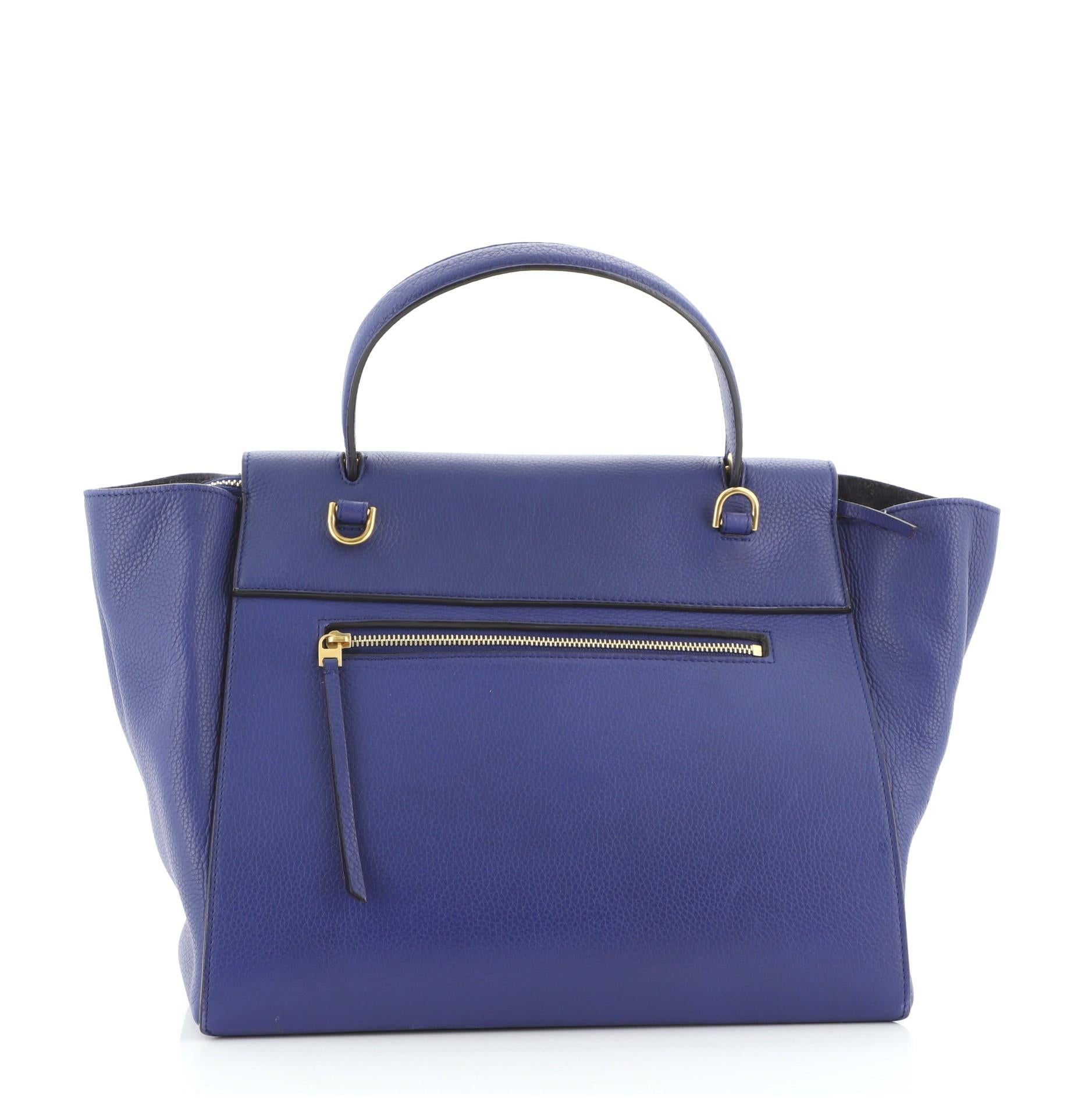 Celine Belt Bag Textured Leather Medium
Blue

Condition Details: Creasing and scuffs on exterior, splitting on base corner wax edges, minor cracking on opening corner wax edges. Moderate wear and discoloration in interior, scratches on