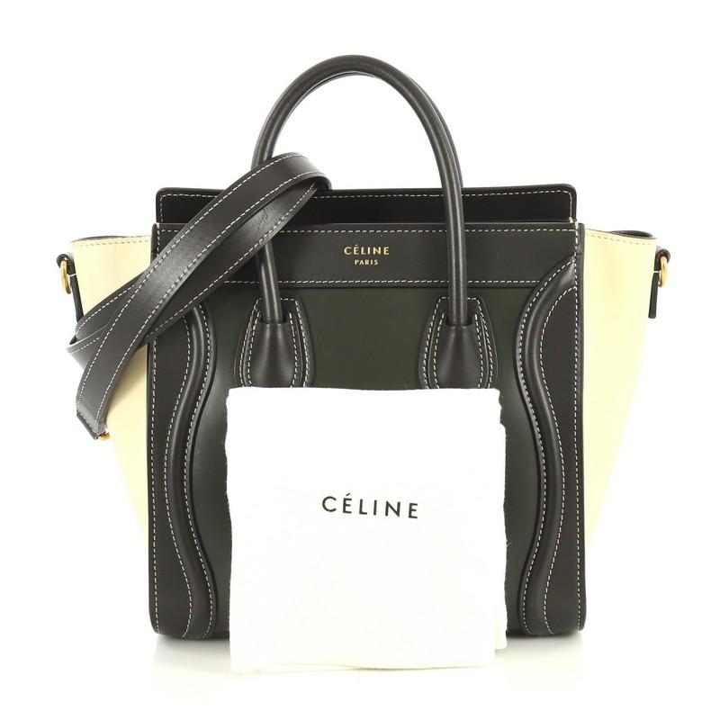 This Celine Bicolor Luggage Handbag Smooth Leather Nano, crafted in brown smooth leather, features an exterior front zip pocket, dual rolled leather handles, and gold-tone hardware. Its top zip closure opens to a brown leather interior with side