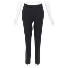 CELINE Schwarze, spitz zulaufende CELINE-Hose mit schräger Tasche aus 100 % Wolle FR38 M