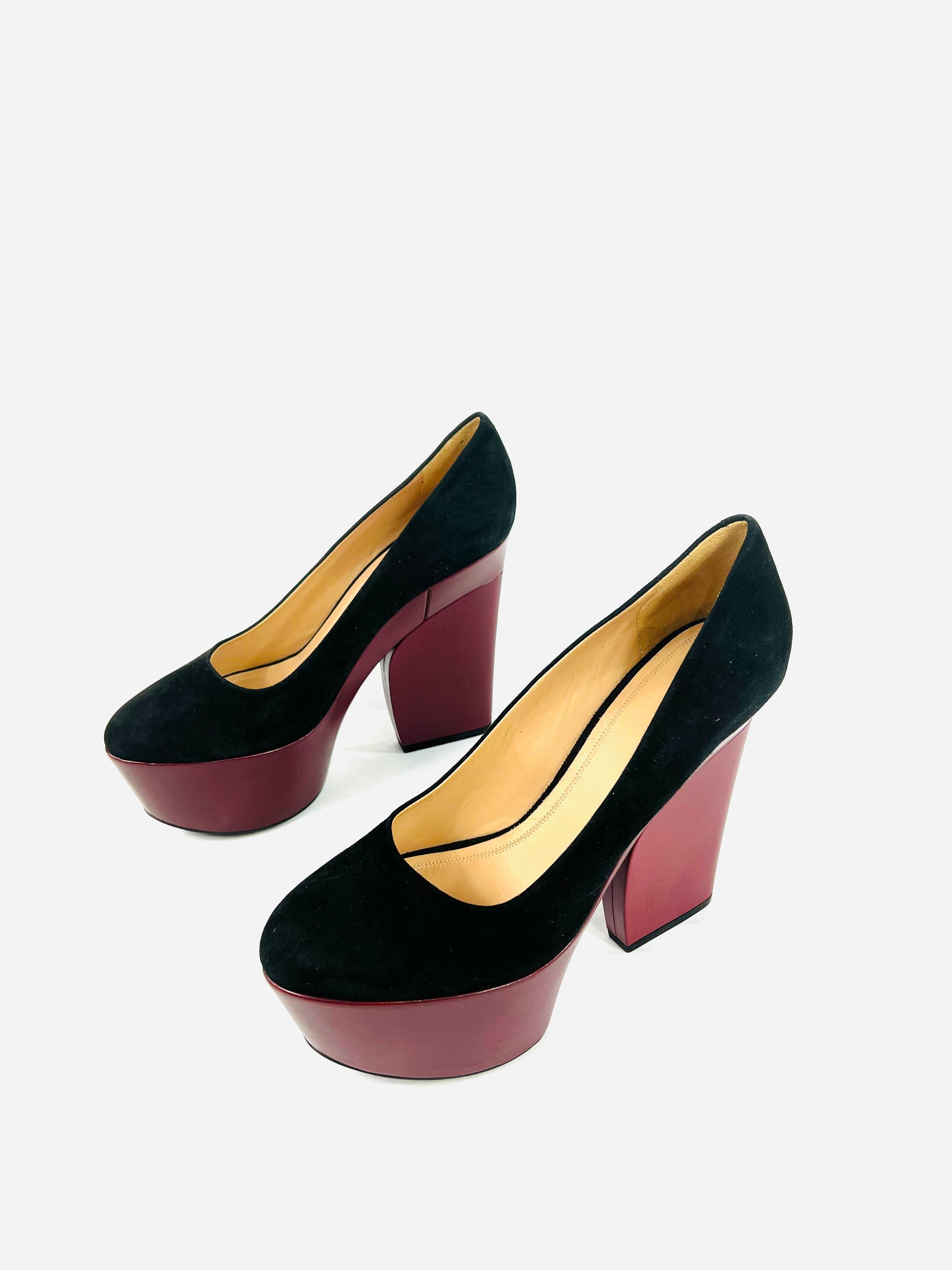Product details:

The shoes are made out of black suede and burgundy leather, it features rounded toe and the heel heigh is 5.75.
