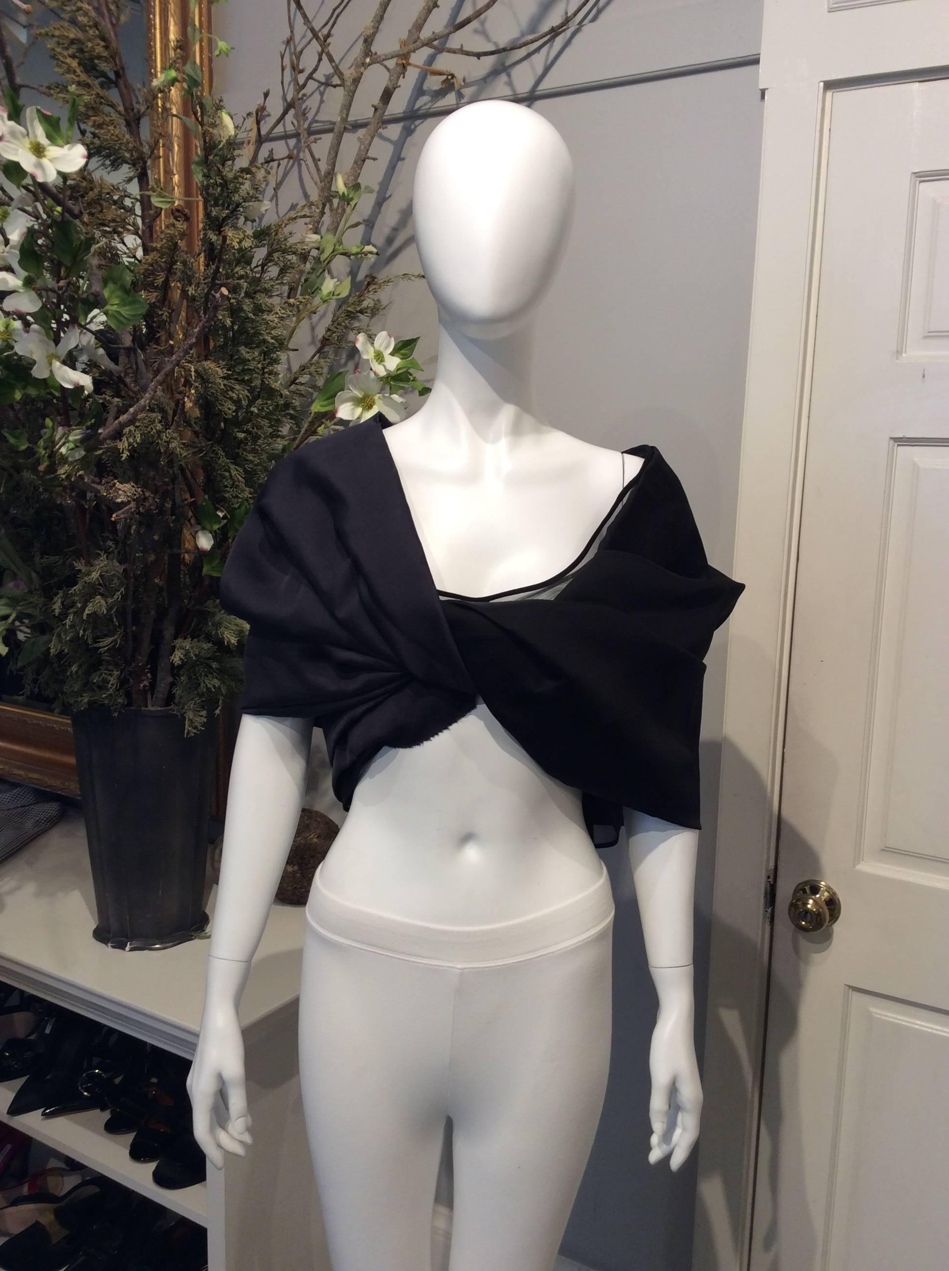 Celine black and navy blue off-the-shoulder cropped shirt from the Phoebe Philo Modele Depose collection. Dramatic draping in front that gathers in a ruched seam in back. Nylon mesh lining throughout. Zipper and hook and eye closure in back.