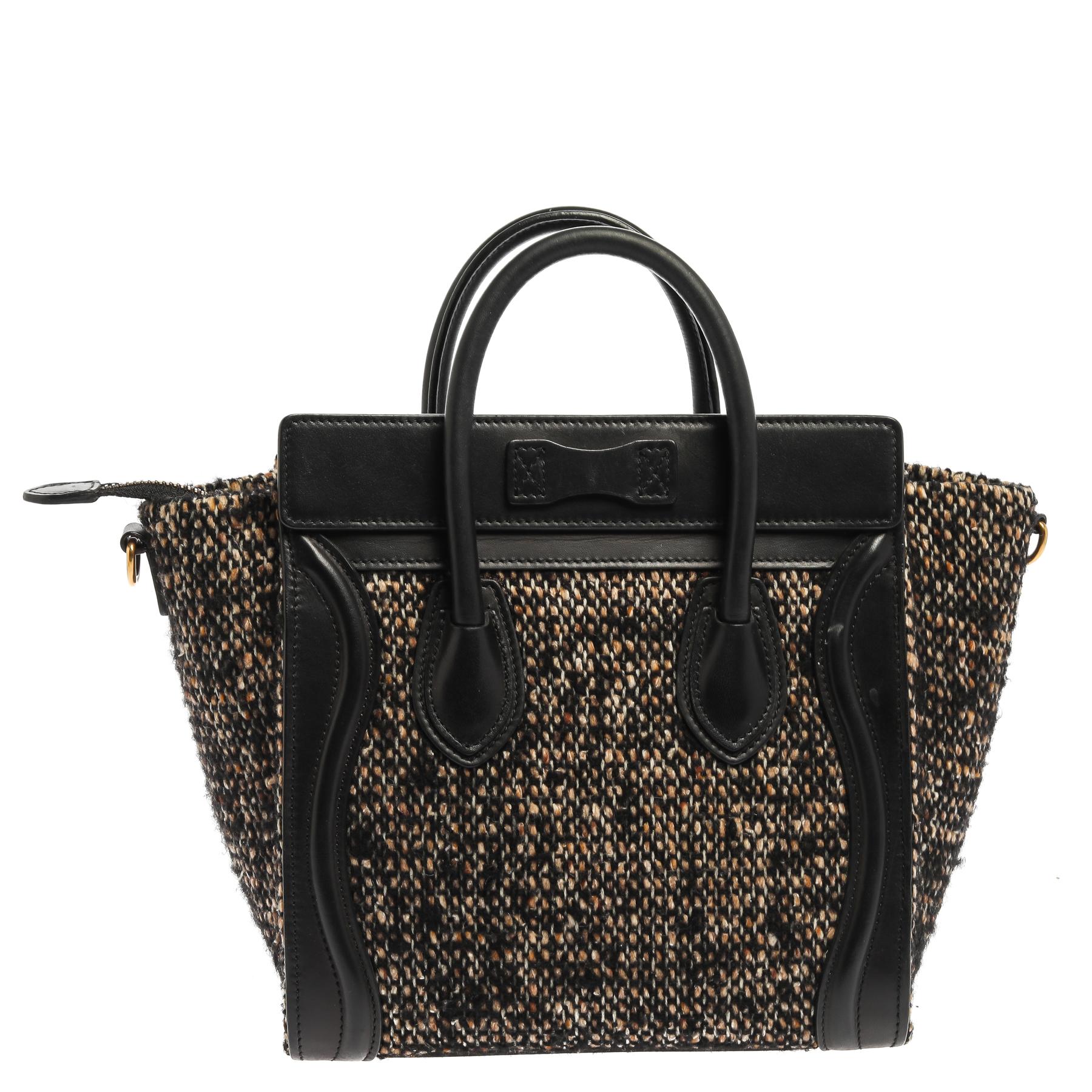 This Celine Luggage tote is stylish and perfect for everyday use. Crafted from tweed and leather, it features the signature flappy wings, double rolled handles, and a front zip pocket. The top zip closure opens to a perfectly sized interior that