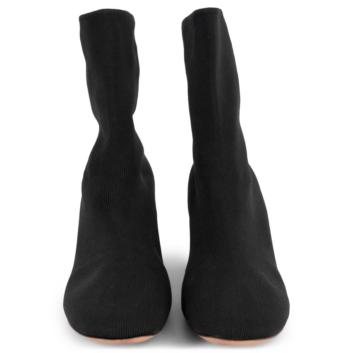 100% authentic Céline block-heel knit sock ankle-boots in black stretchy fabric. Have been worn and are in excellent condition. 

Measurements
Imprinted Size	37.5 (run 1/2 larger)
Shoe Size	38
Inside Sole	25cm (9.8in)
Width	7.5cm (2.9in)
Heel	7cm