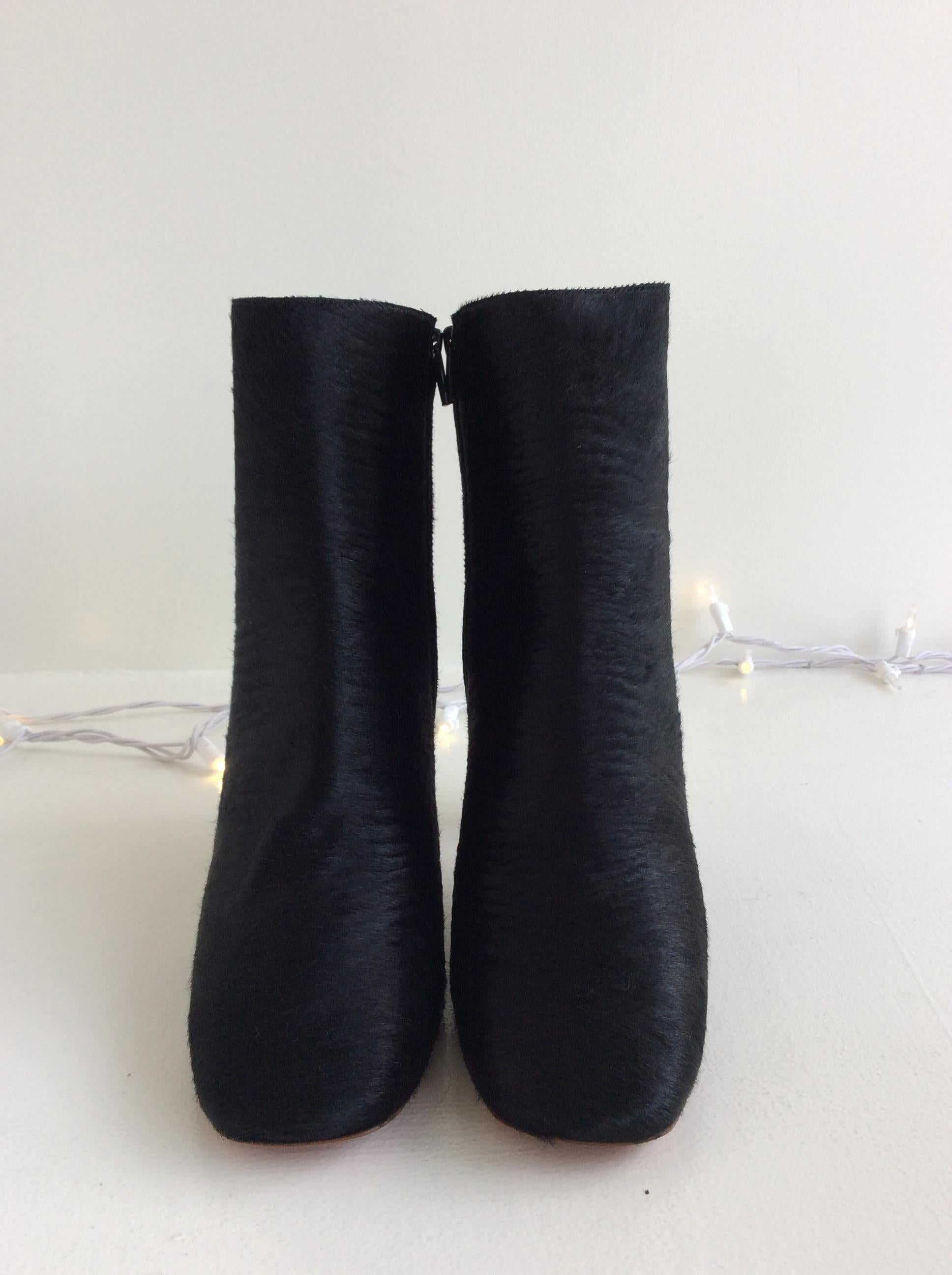 black boot with silver heel