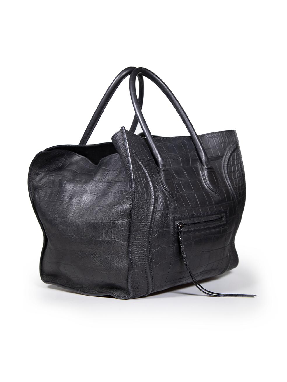CONDITION is Good. General wear to bag is evident. Moderate signs of wear to the front, back, sides, base and lining with scratches, abrasions and marks to the leather. Marks to the lining is seen on this used Céline designer resale