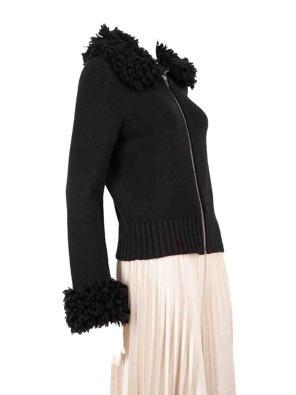 CONDITION is Very good. Minimal wear to the knitwear is evident. There is small pilling to the left sleeve, front top-left, front bottom-left and front bottom-right. Light discolouration to the brand and composition labels. The stitching to the left