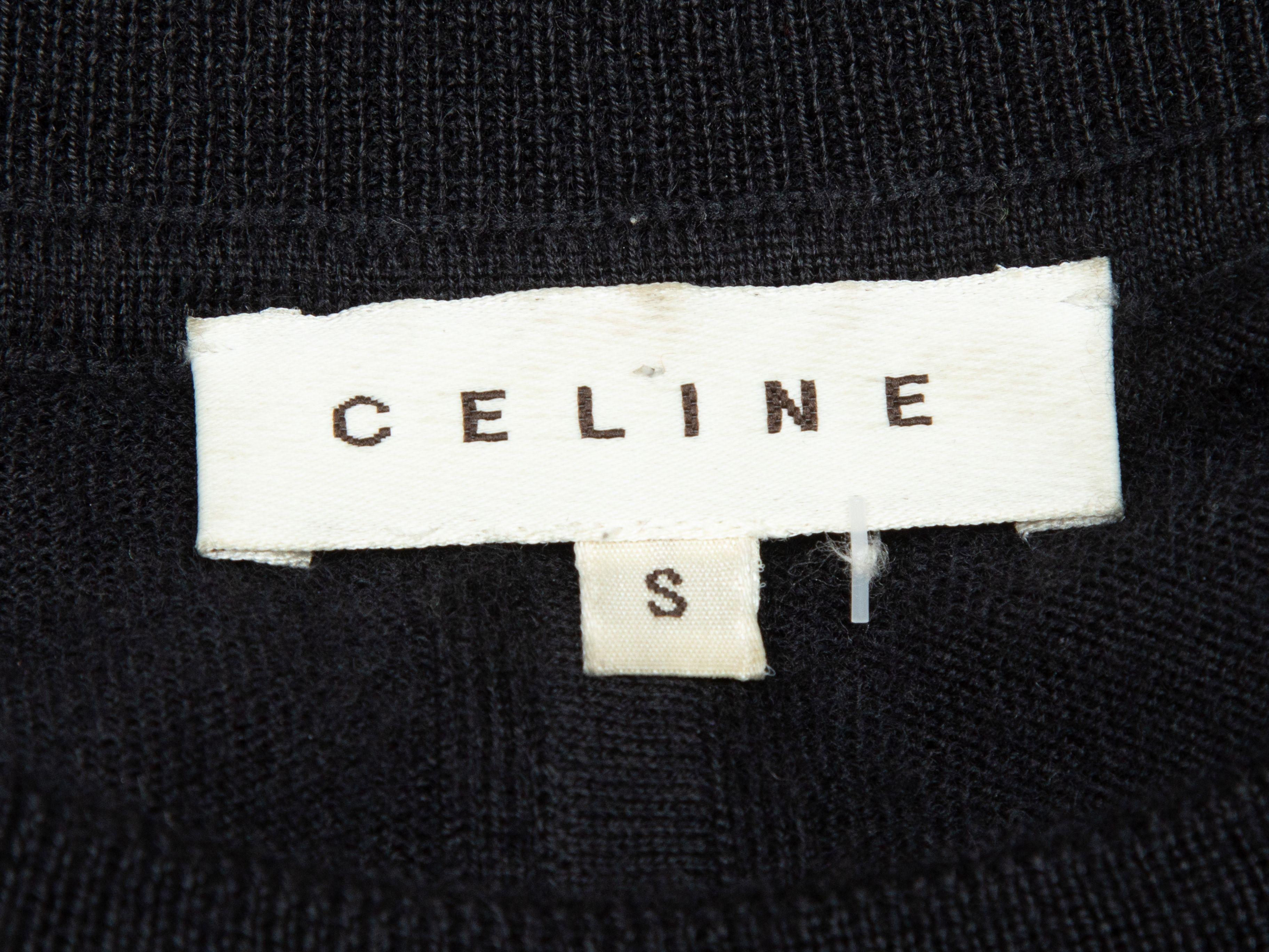 Product Details: Black cashmere and silk-blend top by Celine. Crew neck. Short dolman sleeves. 44