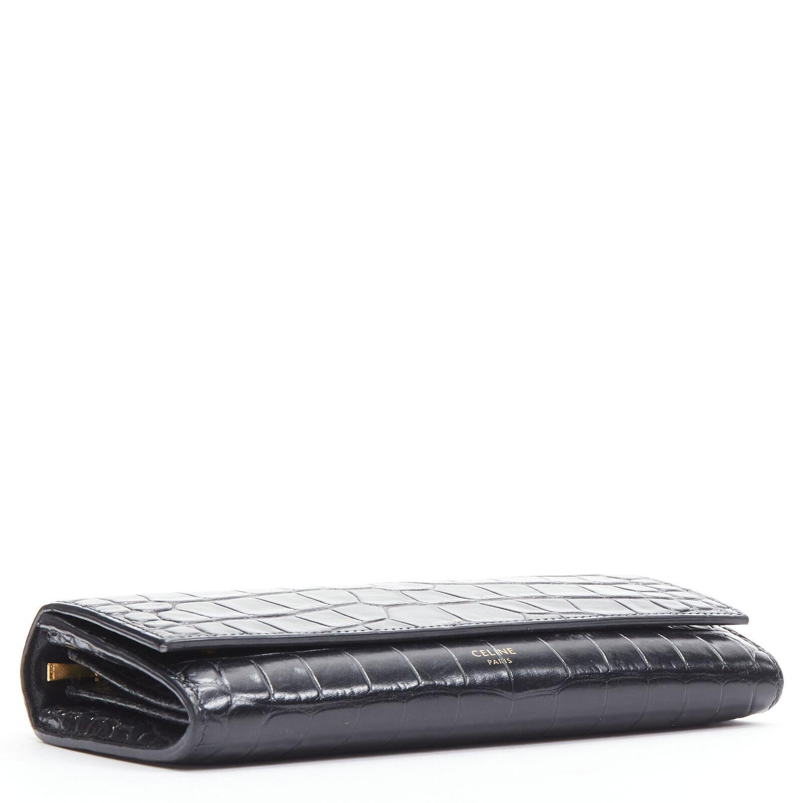 Women's CELINE black croc embossed calfskin flap front long wallet For Sale