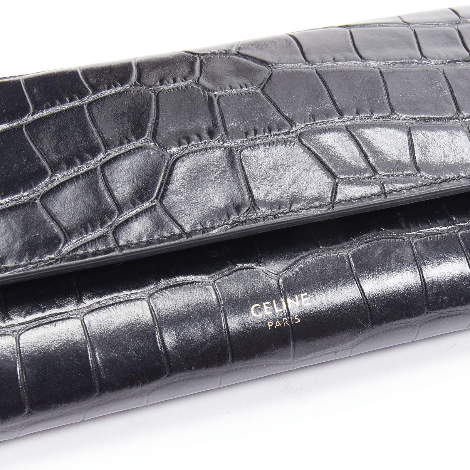 CELINE black croc embossed calfskin flap front long wallet For Sale 4