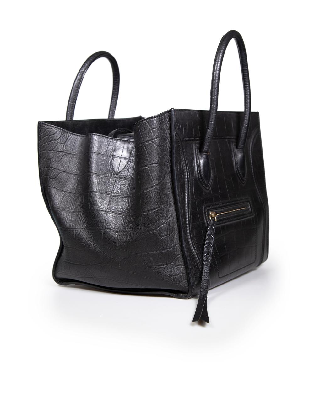 CONDITION is Very good. Minimal wear to bag is evident. Minimal wear to the base corners, rear and lining with abrasions and marks to the leather on this used Céline designer resale item.
 
 
 
 Details
 
 
 Model: Mini Phantom Tote
 
 Black
 
