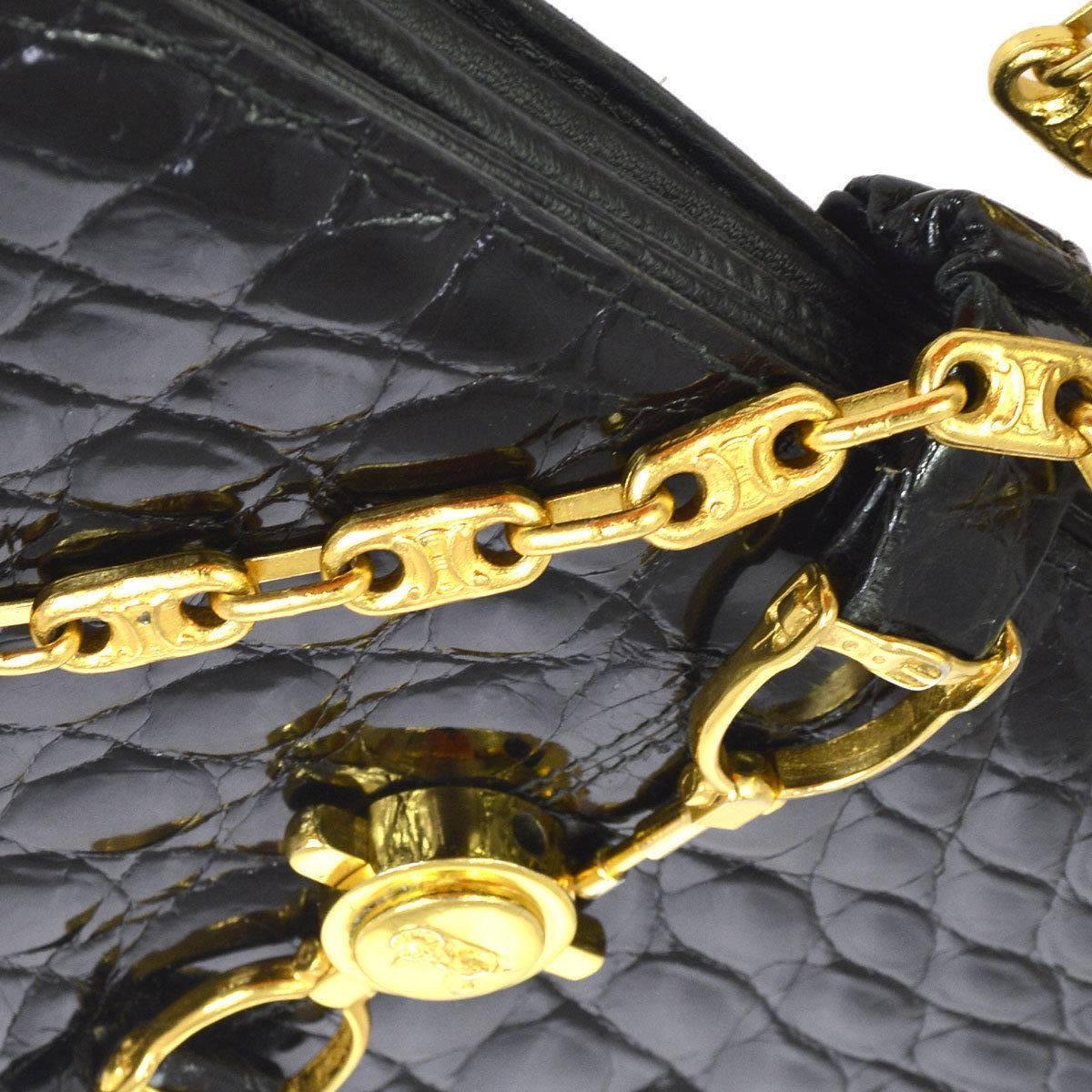 Celine Black Crocodile Leather Gold Evening 2 in 1 Clutch Shoulder Flap Bag

Crocodile leather
Gold tone hardware
Leather lining 
Made in Italy 
Removable shoulder strap drop 12