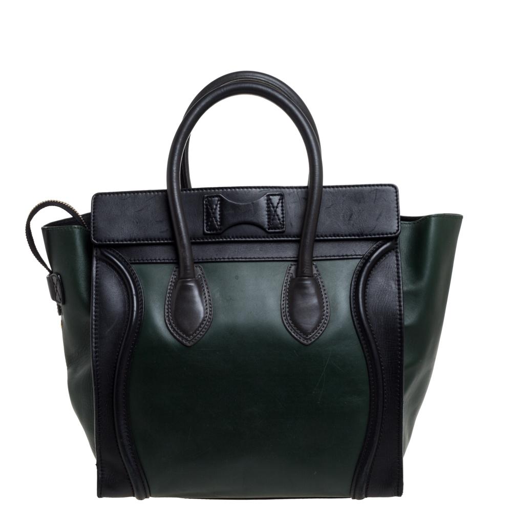 This Celine Luggage tote is stylish and perfect for everyday use. Crafted from leather, it features the signature flappy wings, double rolled handles, and a front zip pocket. The top zip closure opens to a perfectly sized interior that will hold all
