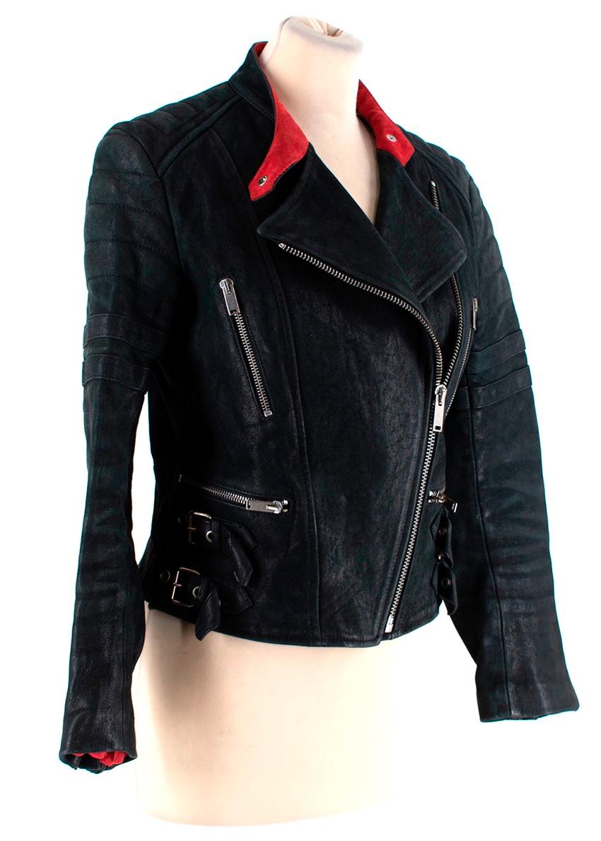 Celine Black Distressed Leather Biker Jacket
 

 - Collarless biker jacket with quilted panels
 - Aged, distressed leather
 - Contrast red reveres, and lining
 - Silver tone hardware
 - Close fitting, cropped silhouette
 - Phoebe Philo era Celine

