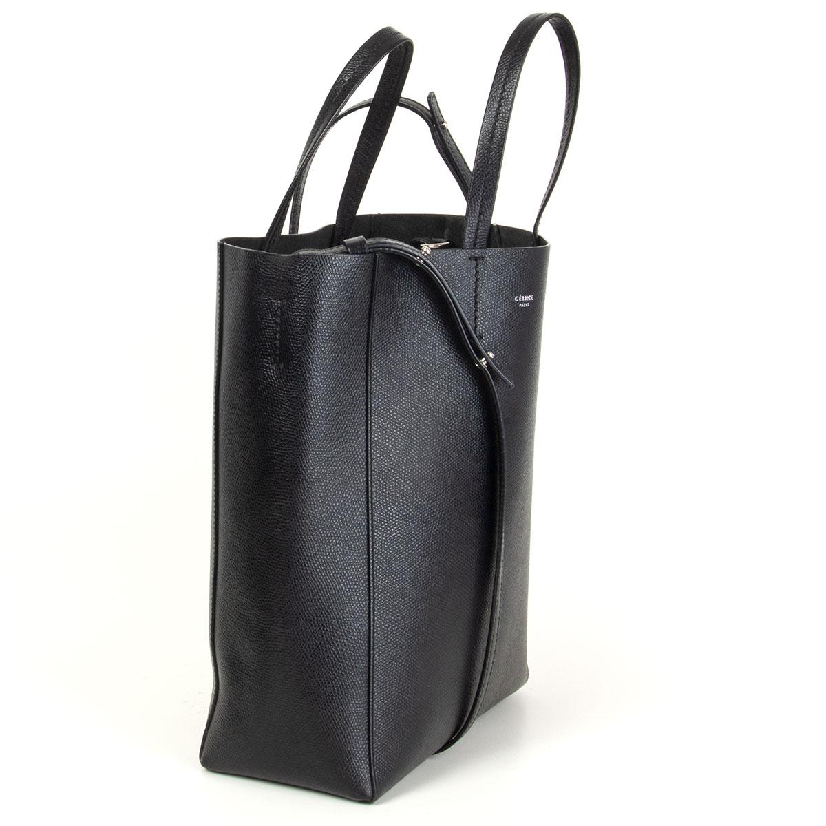 Céline 'Small Cabas' tote bag in black grained calfskin. Unlined with one zipper pocket against the back. Detachable shoulder strap. Has been carried and is in excellent condition. Comes with dust bag. 

Height 28cm (10.9in)
Width 22cm (8.6in)
Depth