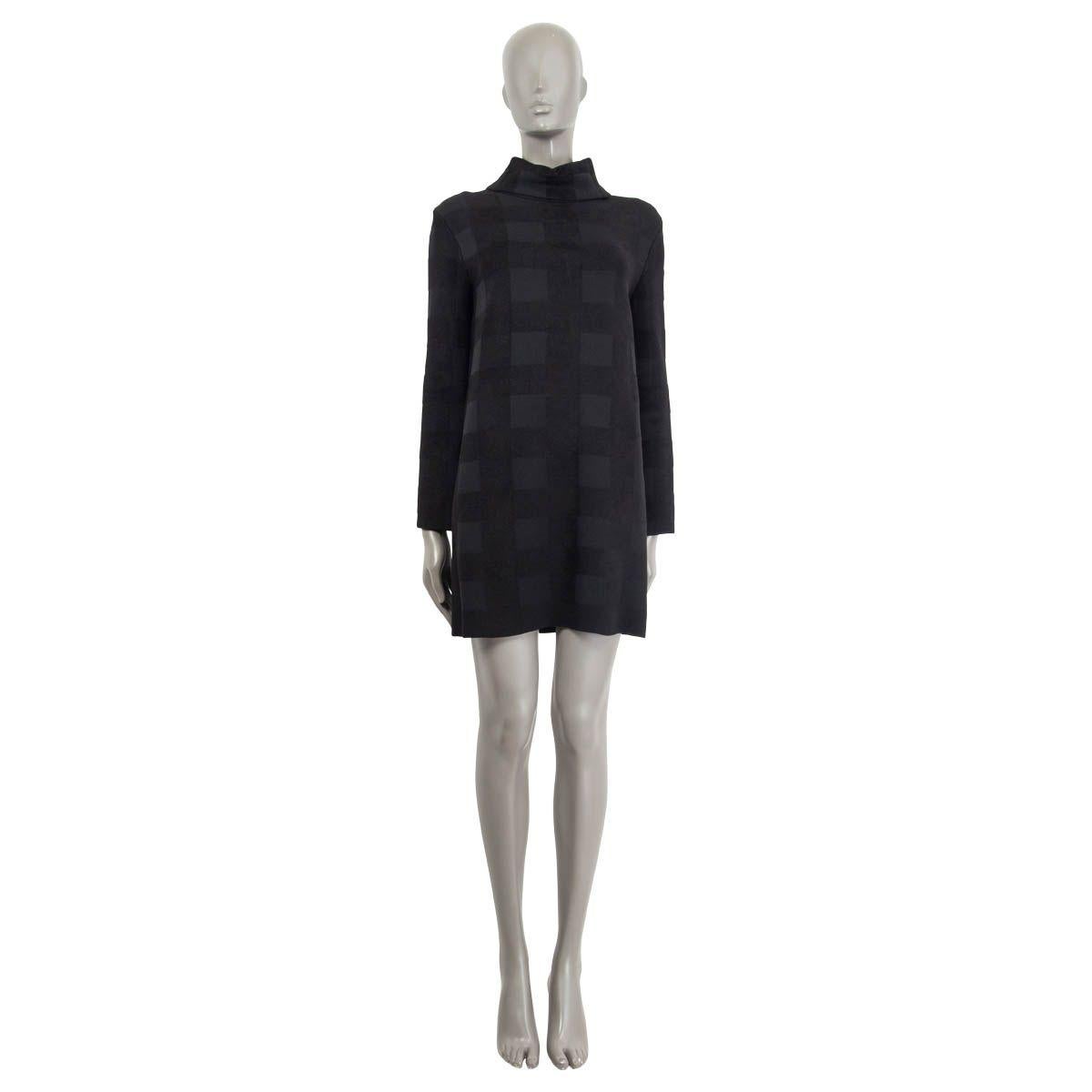 100% authentic Céline high neck knit dress in black and charcoal viscose (73%), polyamide (22%), polyester (3%) and elastane (2%). Features long sleeves and a check print. Unlined. Has been worn and is in excellent condition.

Measurements
Tag