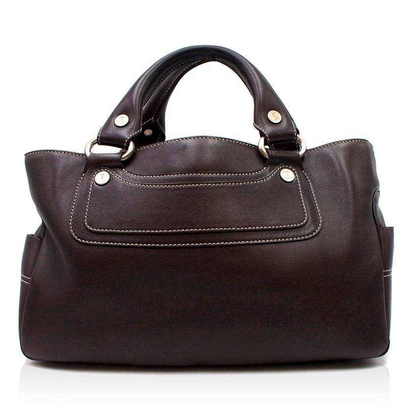Celine Black Leather Boogie Bag

- Celine Boogie Bag
- Brown leather
- White contrast stitch
- Silver-tone hardware
- Double rolled handles
- Two external slip pockets
- Brown leather lining
- Central zipped compartment with two spacious sections on