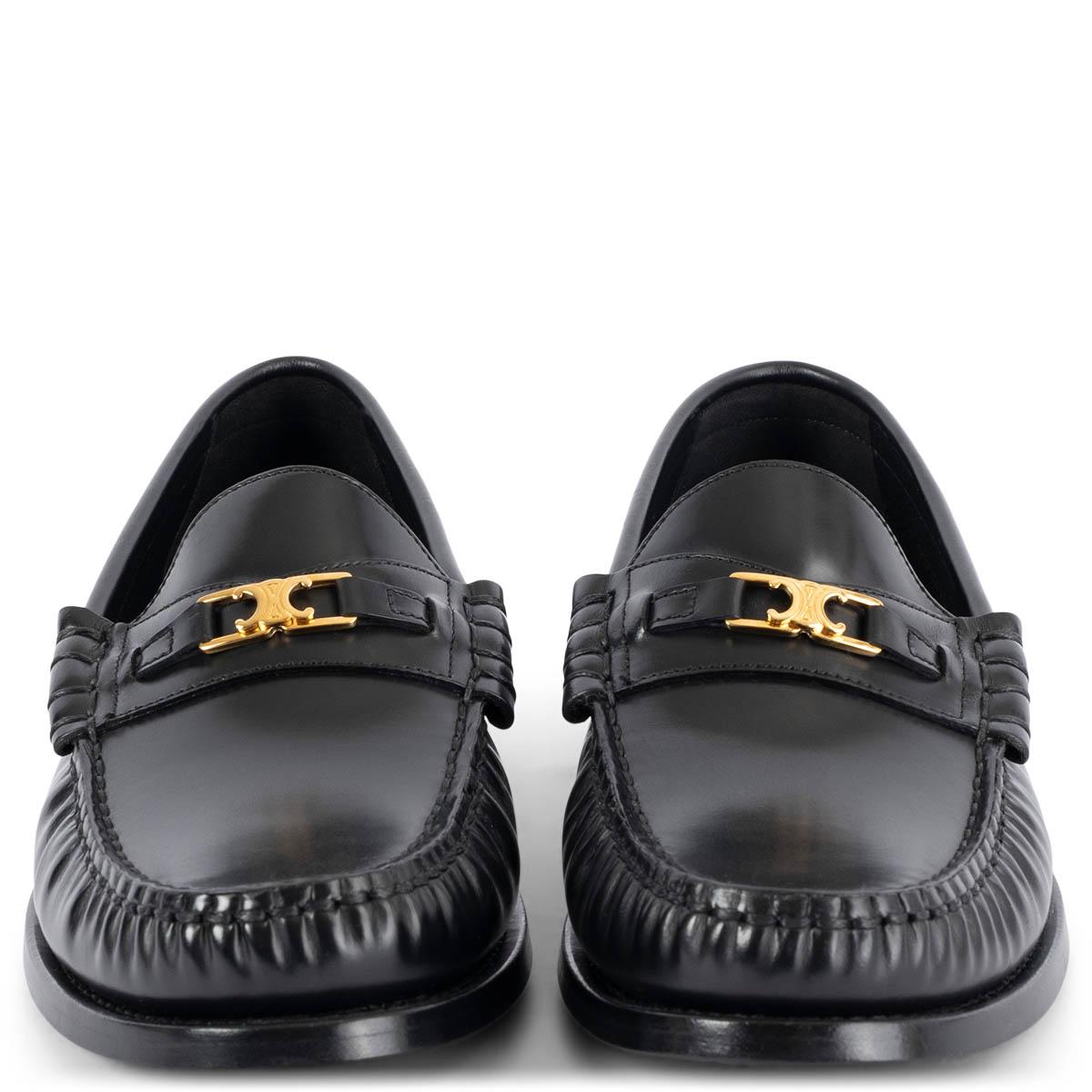 100% authentic Celine Luco Triomphe loafers in black polished calfskin featuring gold-tone hardware. Brand new.

Measurements
Imprinted Size	38.5
Shoe Size	38.5
Inside Sole	25.5cm (9.9in)
Width	8cm (3.1in)
Heel	2cm (0.8in)
Hardware	Gold-Tone

All